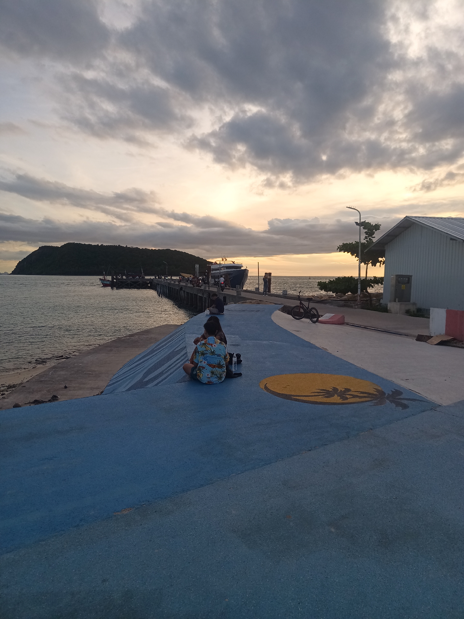 Evening pier gathering captured in Koh Phangan, Thailand