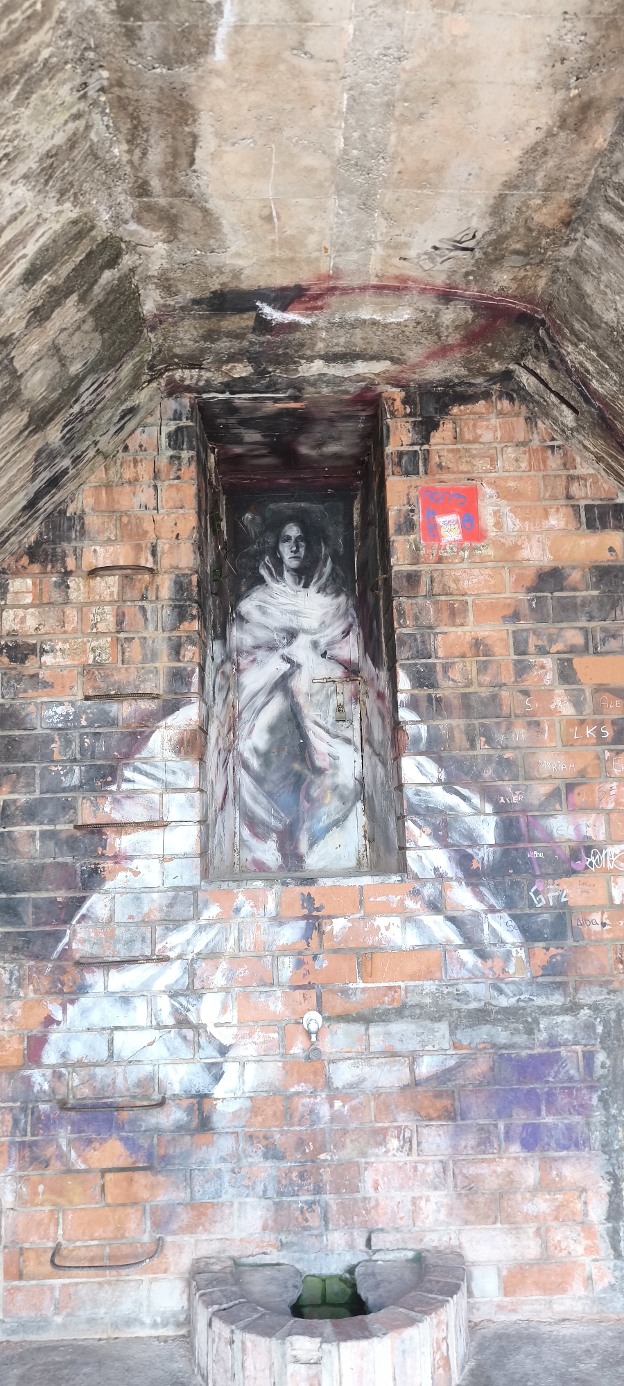 Bold street murals cover building walls in Fanzara, Spain