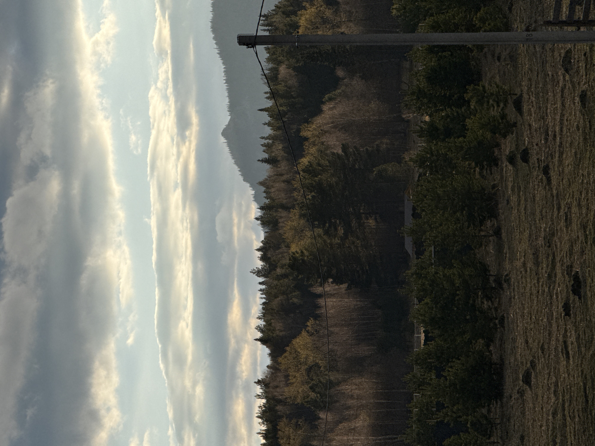 Rural Tyulyuk landscape documented under partly cloudy April skies