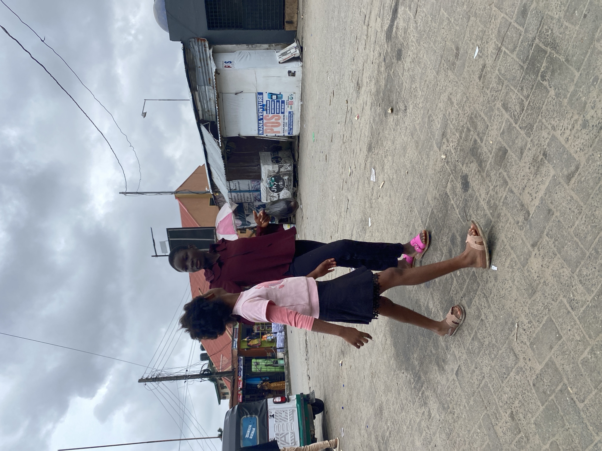Sunday morning street life in a busy urban neighborhood