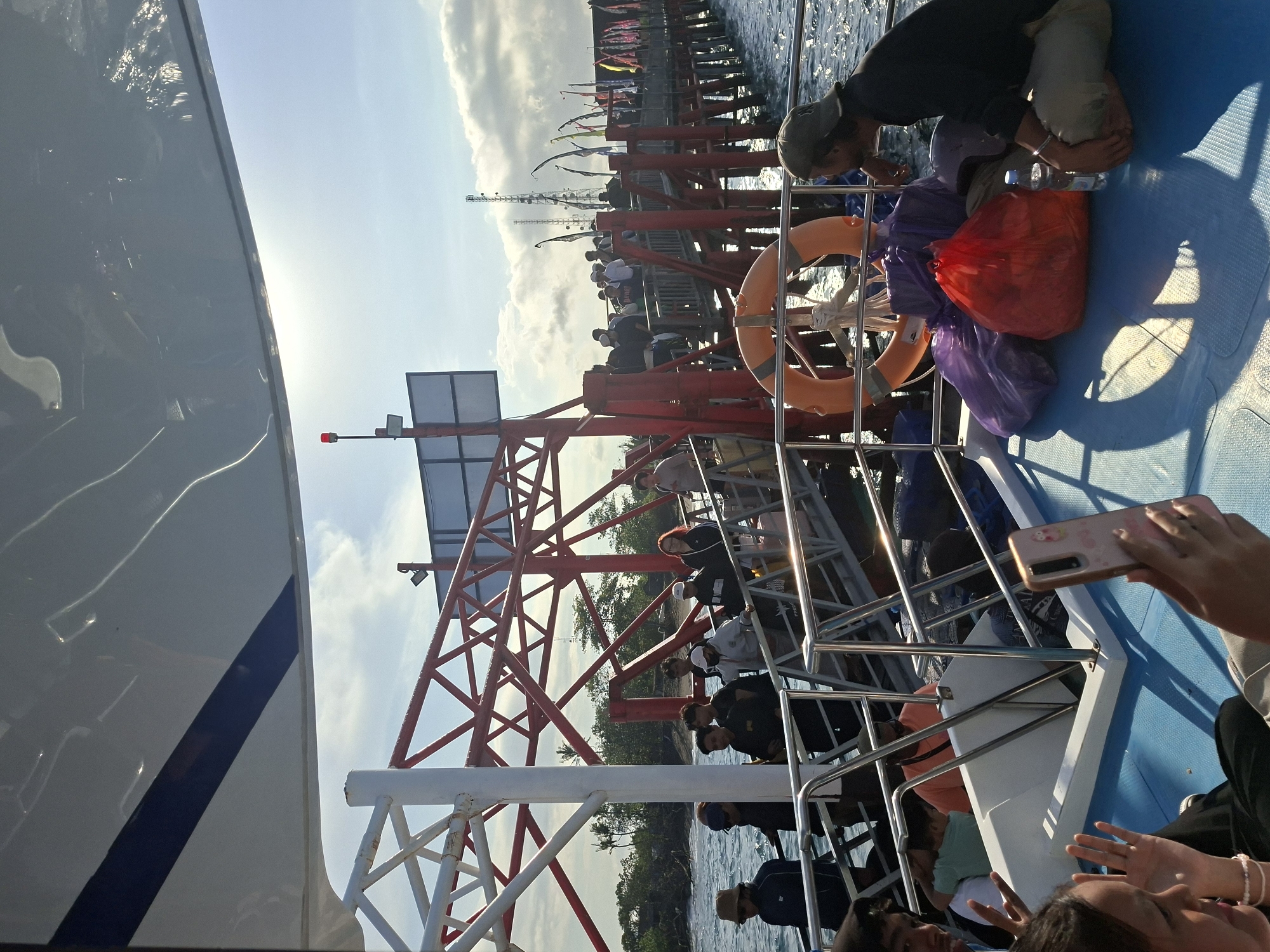 Ferry crossing near Dawan pier on a clear morning