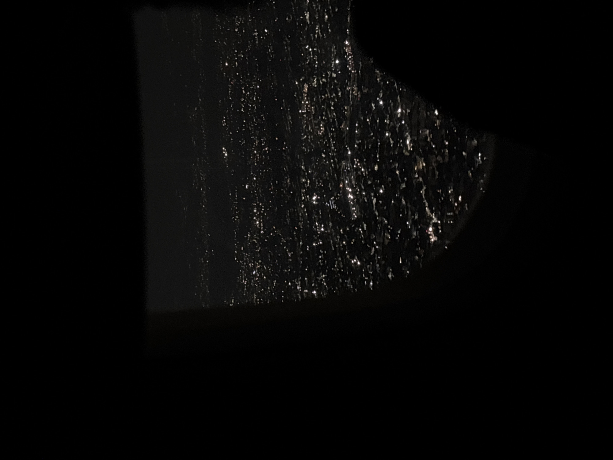 Nighttime urban scenes: rainy window view and underground tunnel documented