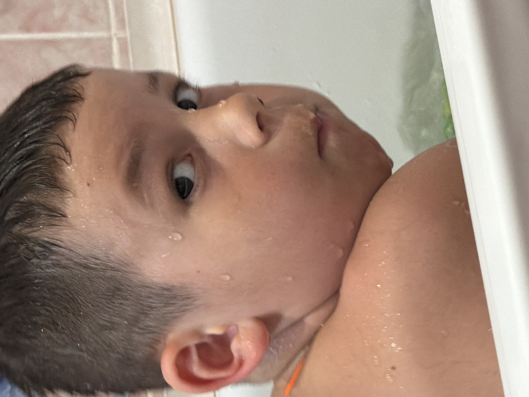 Child bathtime documented in Chaikovsky home bathroom