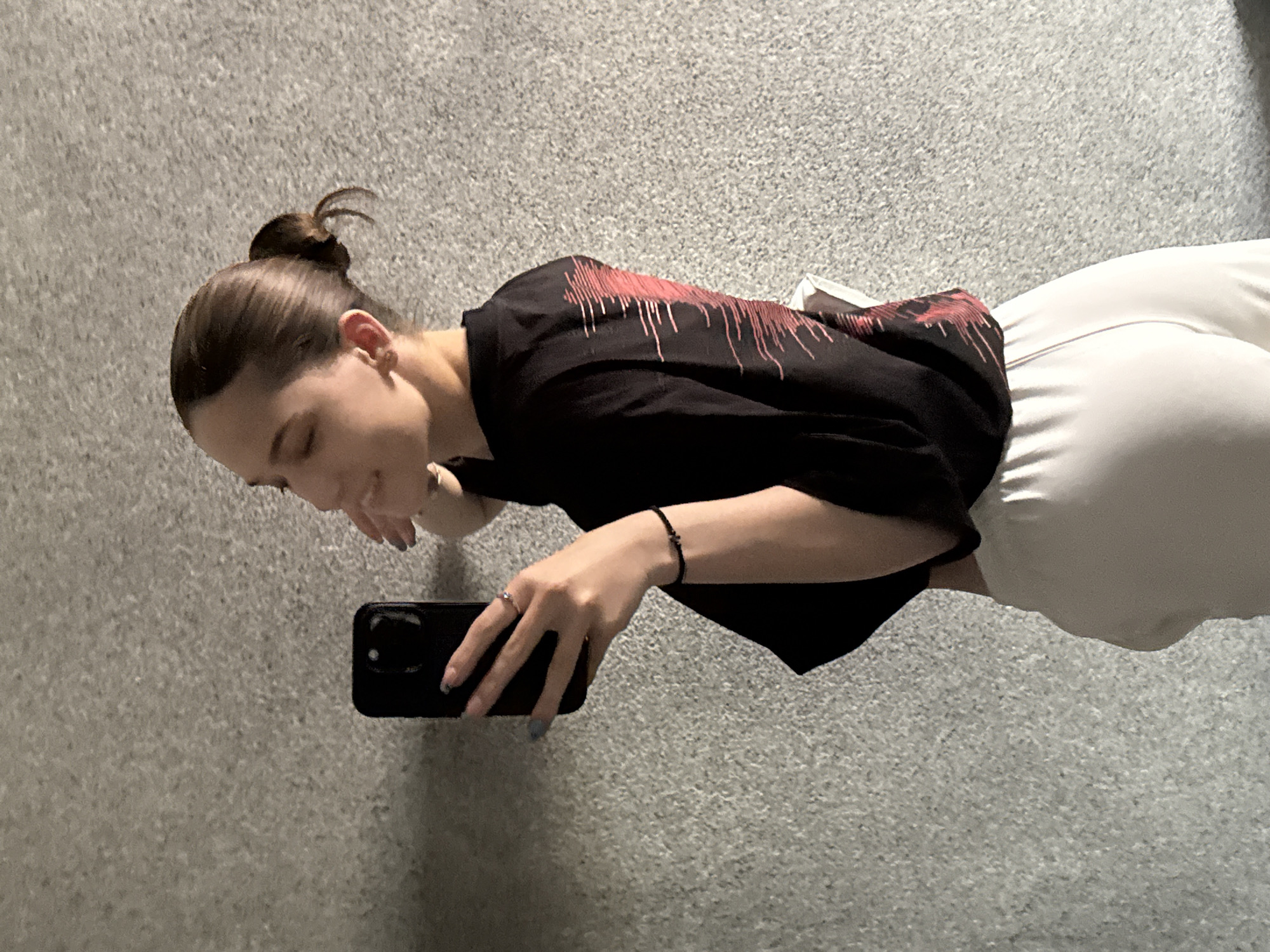 Woman takes selfies with dog in Sofia apartment