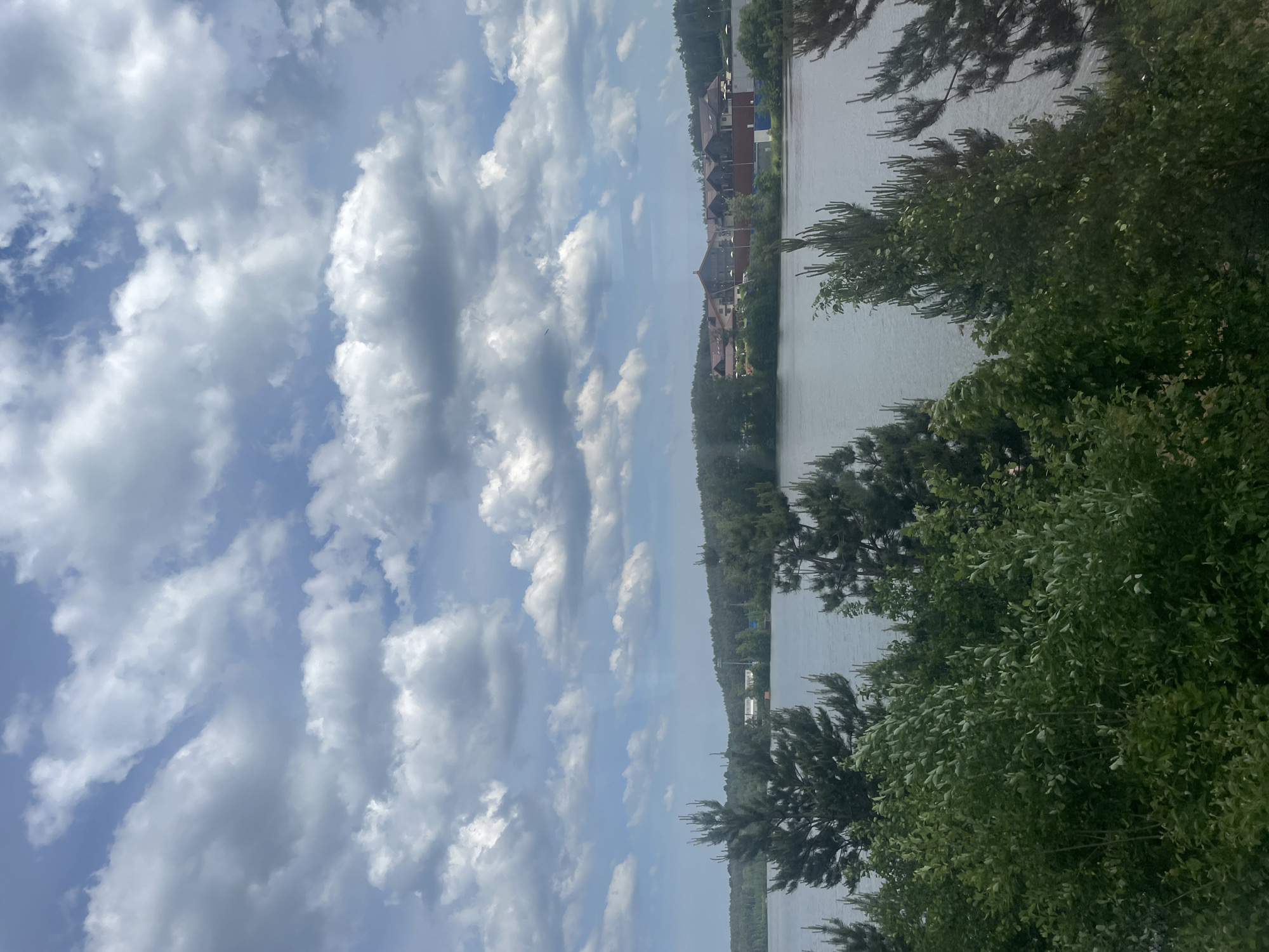 Scenic water views captured from moving vehicles in Osel'ki, Russia