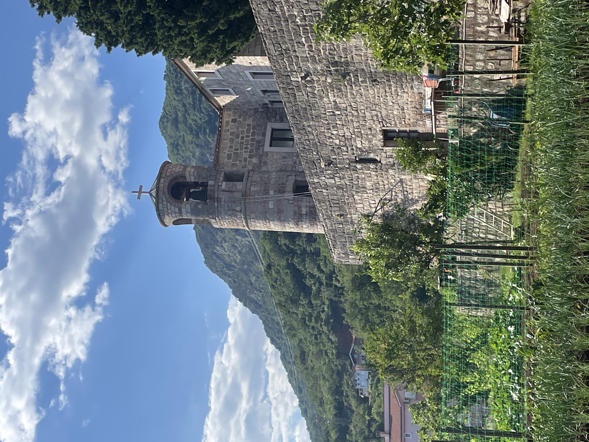 Tourist documents Montenegro's historic churches and architecture in Budva