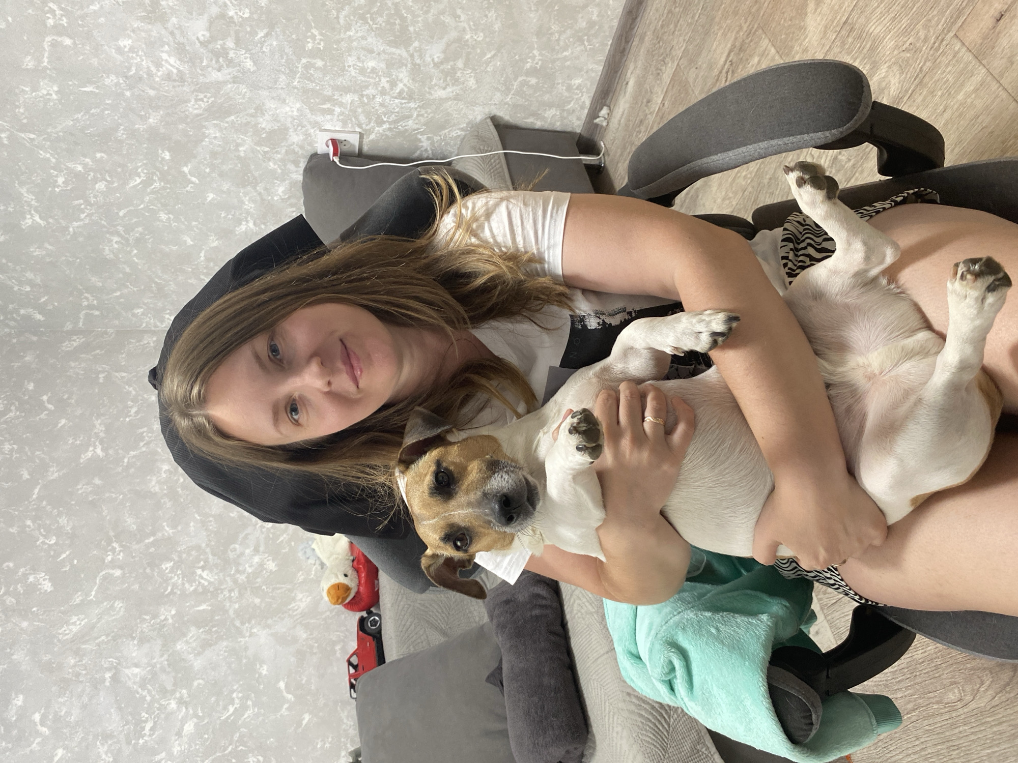 Woman enjoys morning with pets amid snowfall in Noviy