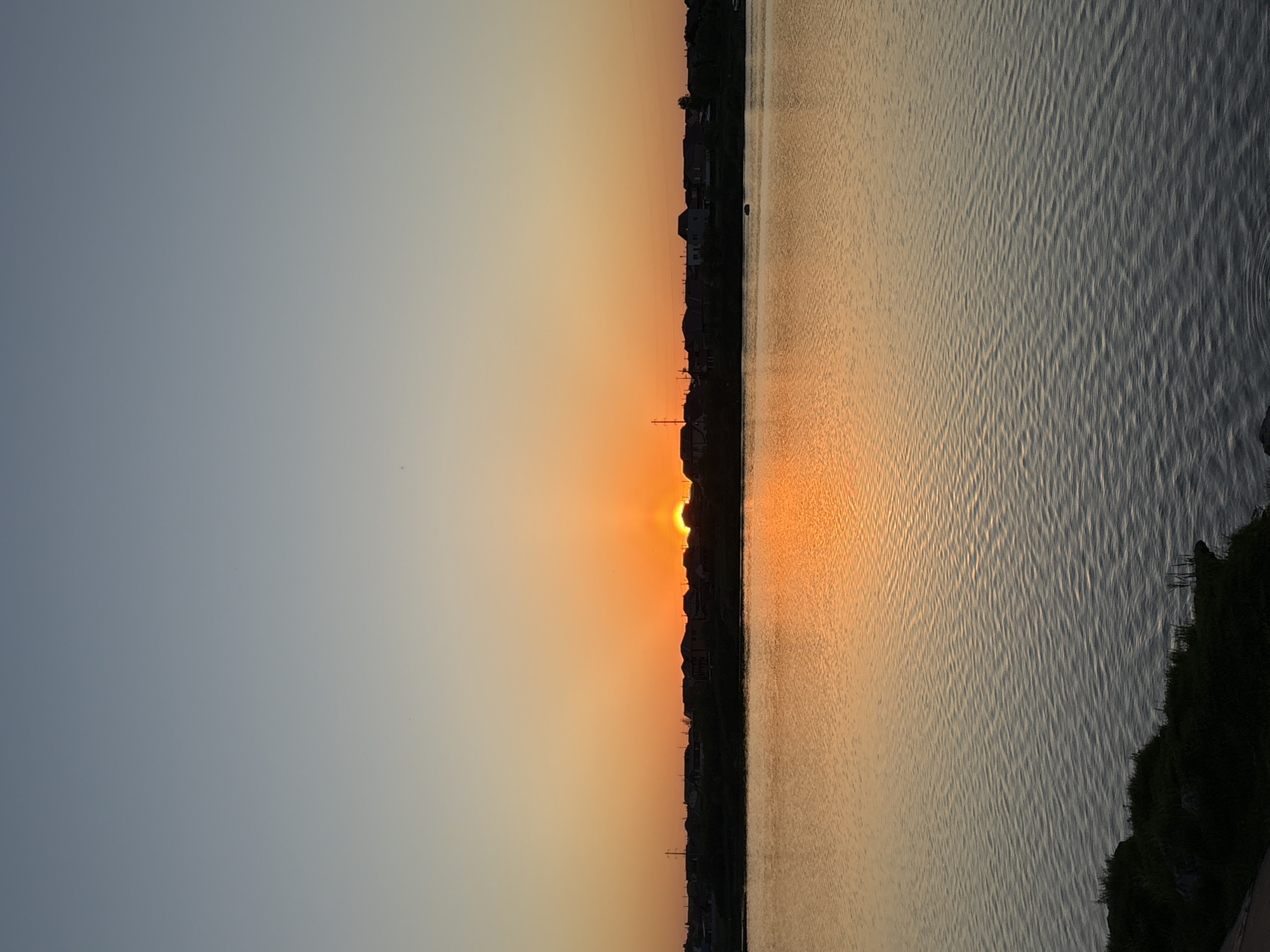 Sunset observed over water body in Krasnoyarsk, Russia