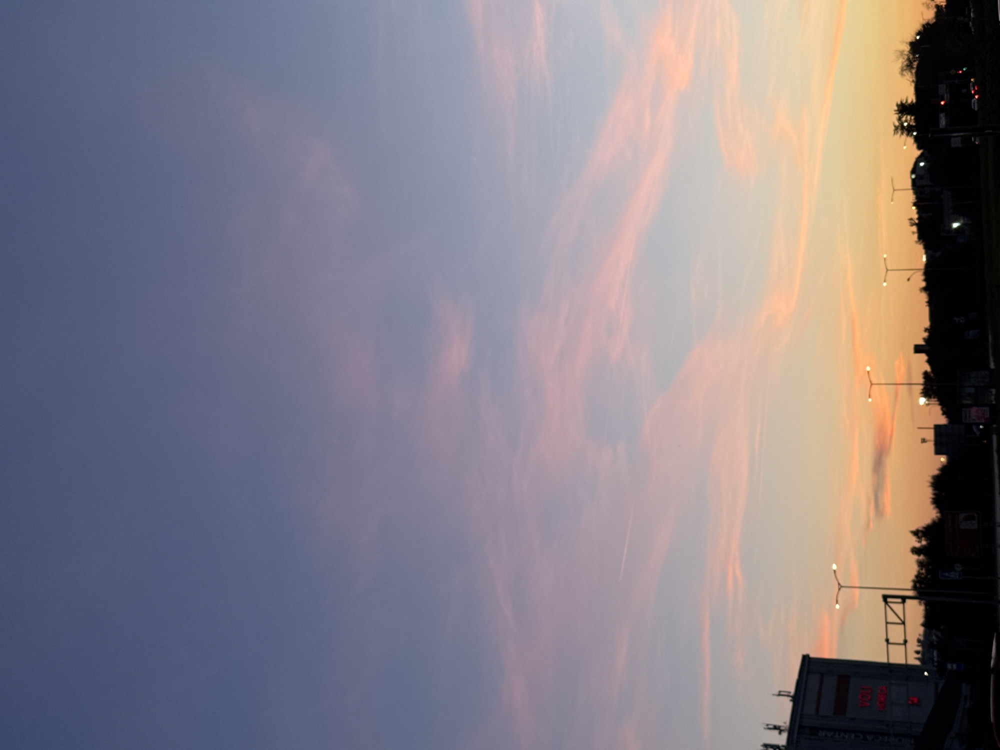 Sunset church towers and work-life reflection captured in Bar