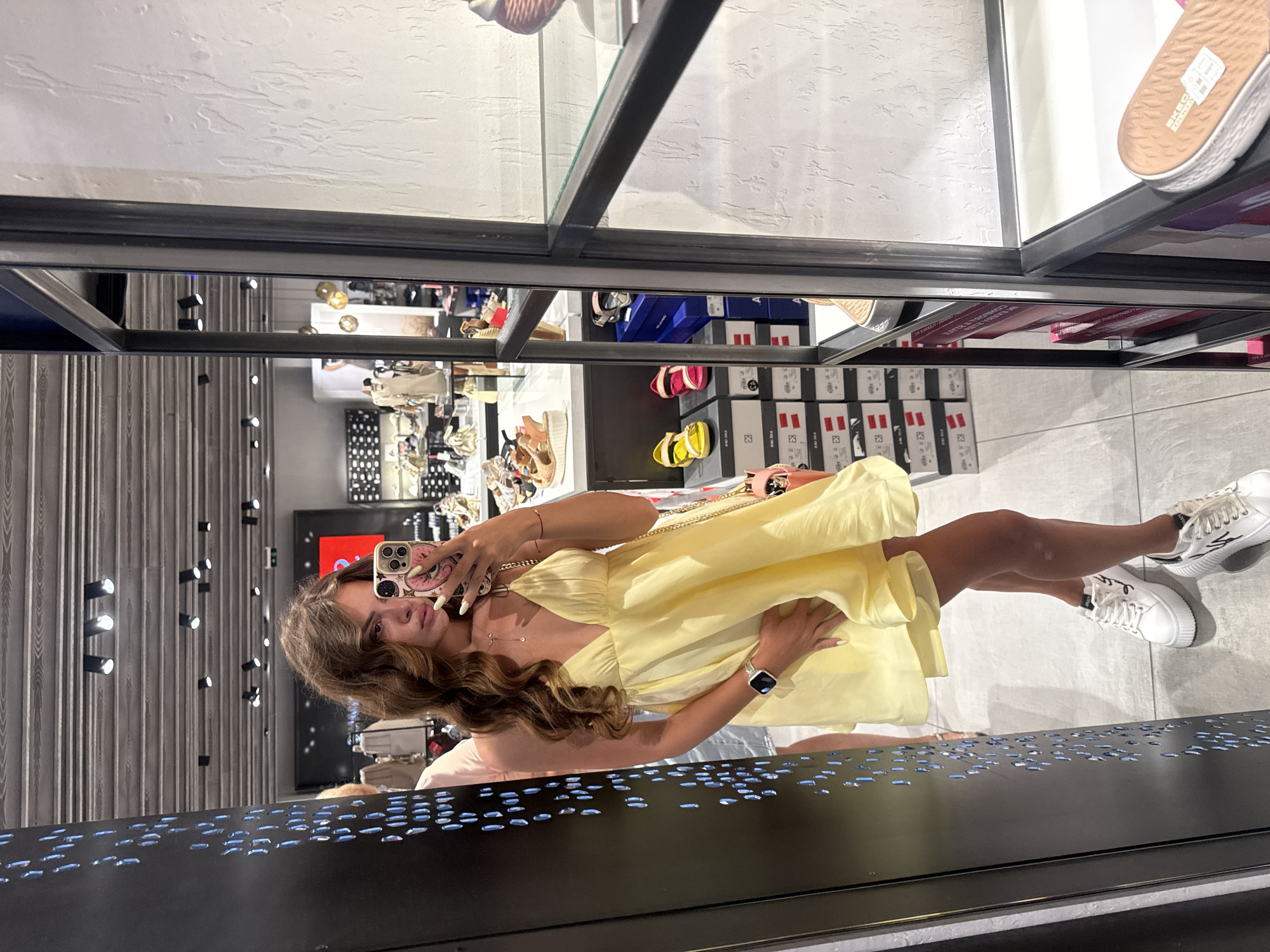 Mirror selfie in a Plovdiv shoe store, yellow dress and platforms