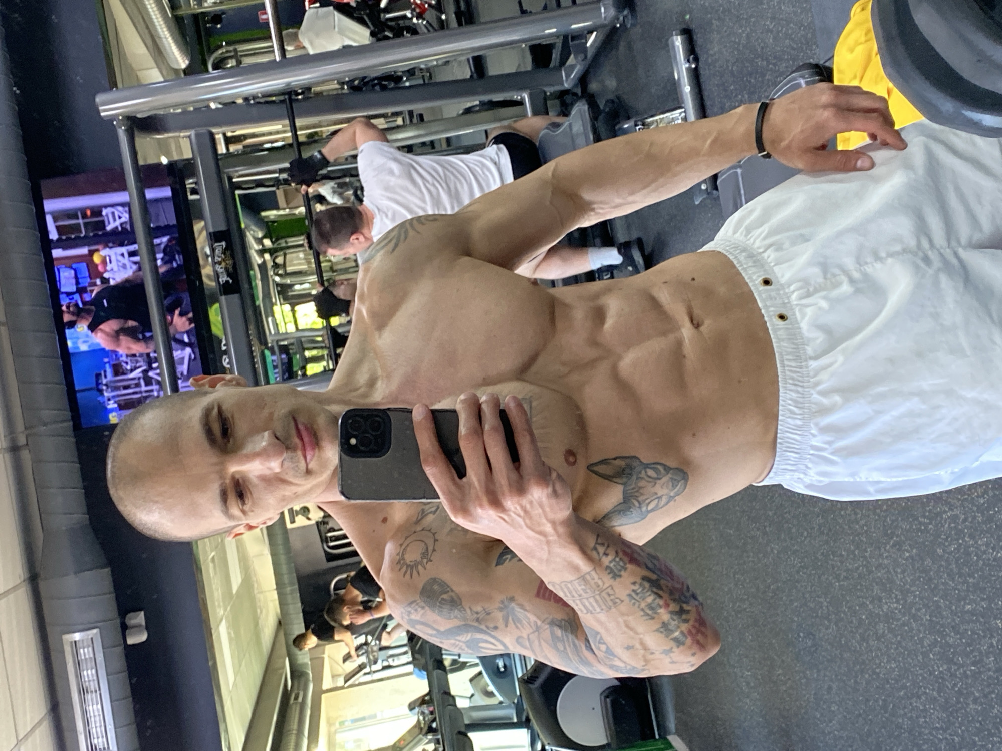 Tattooed man takes gym selfie in Pleven, Bulgaria