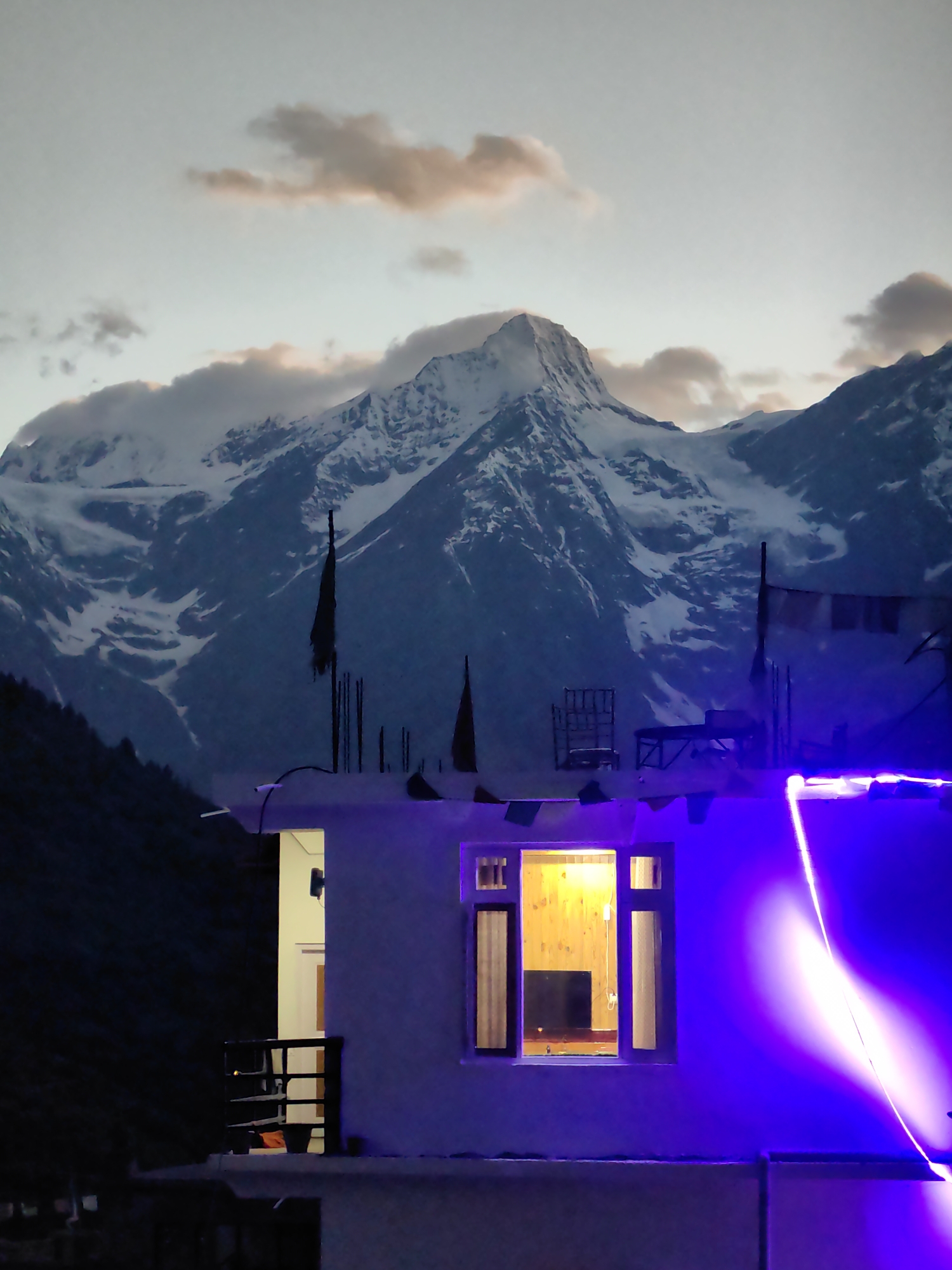 Keylong at dusk: mountain scenery, sheep on the road, valley life