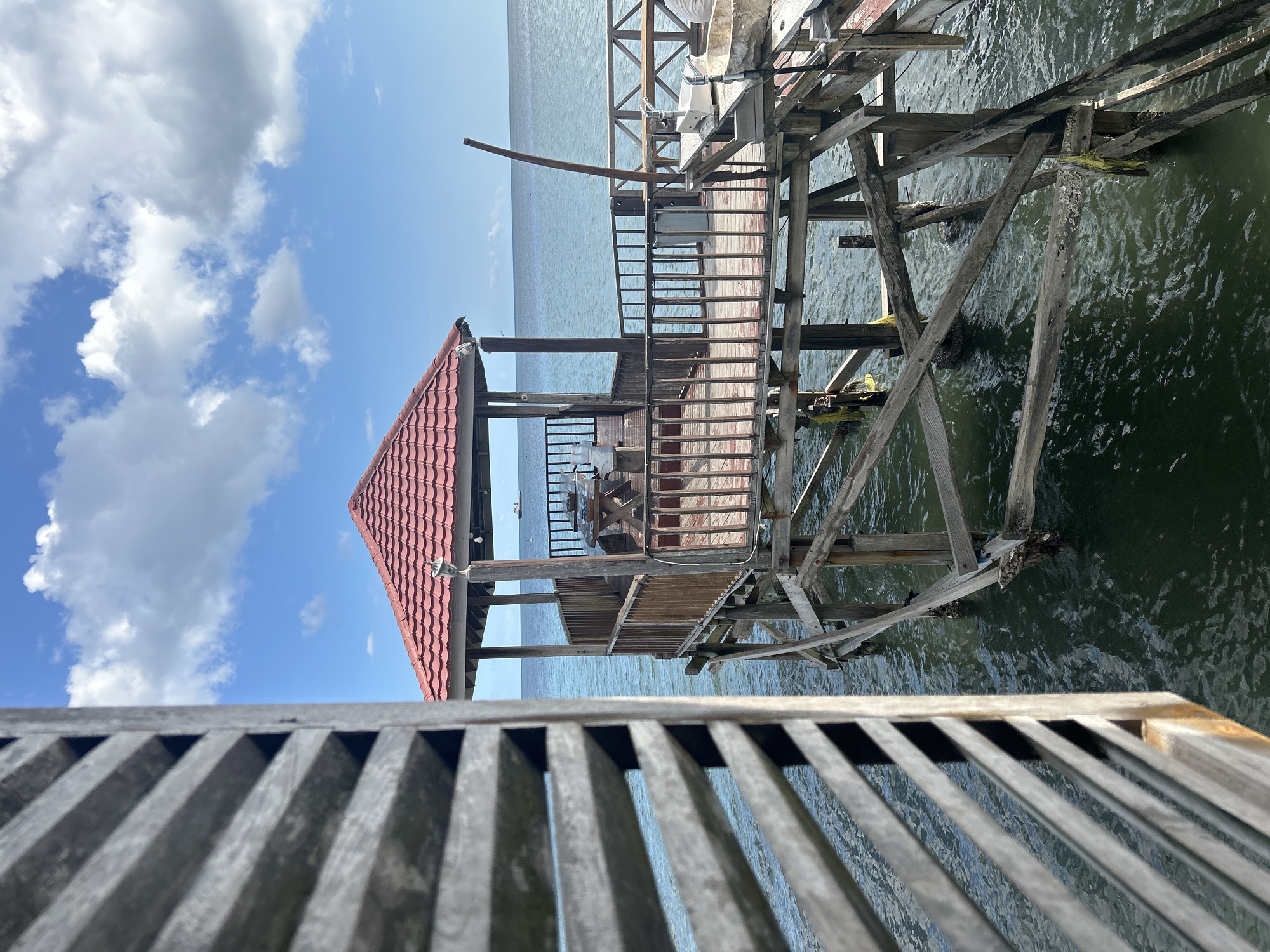 Beachside life in Ara: boats, ocean views, and local food