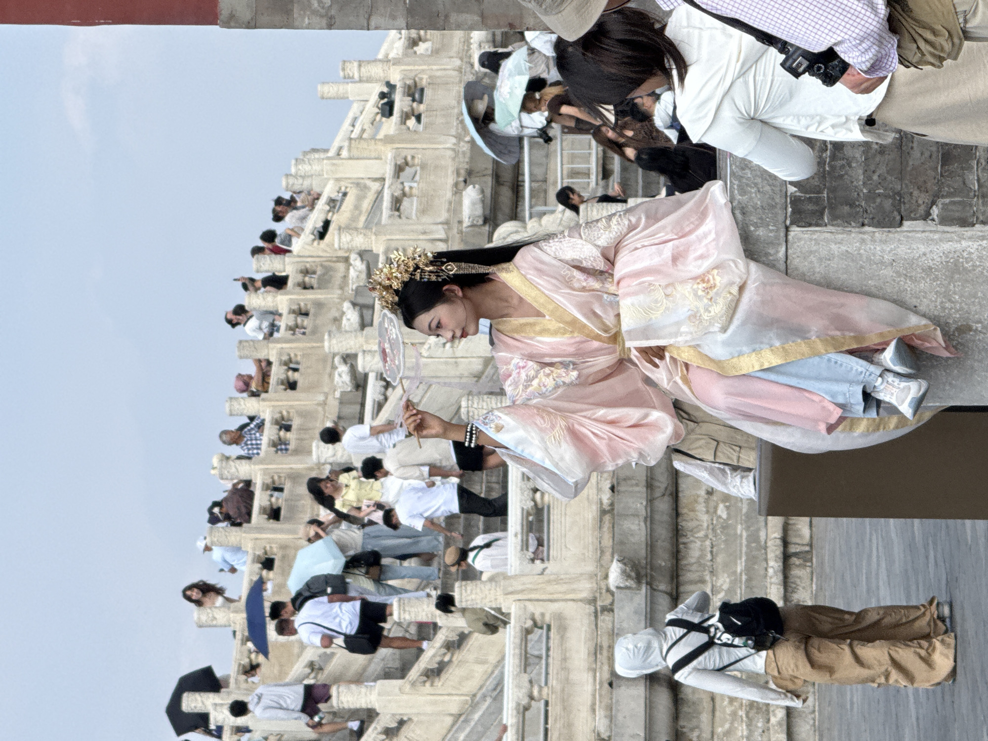 Traditional Chinese attire scene in Beijing's Dongcheng District