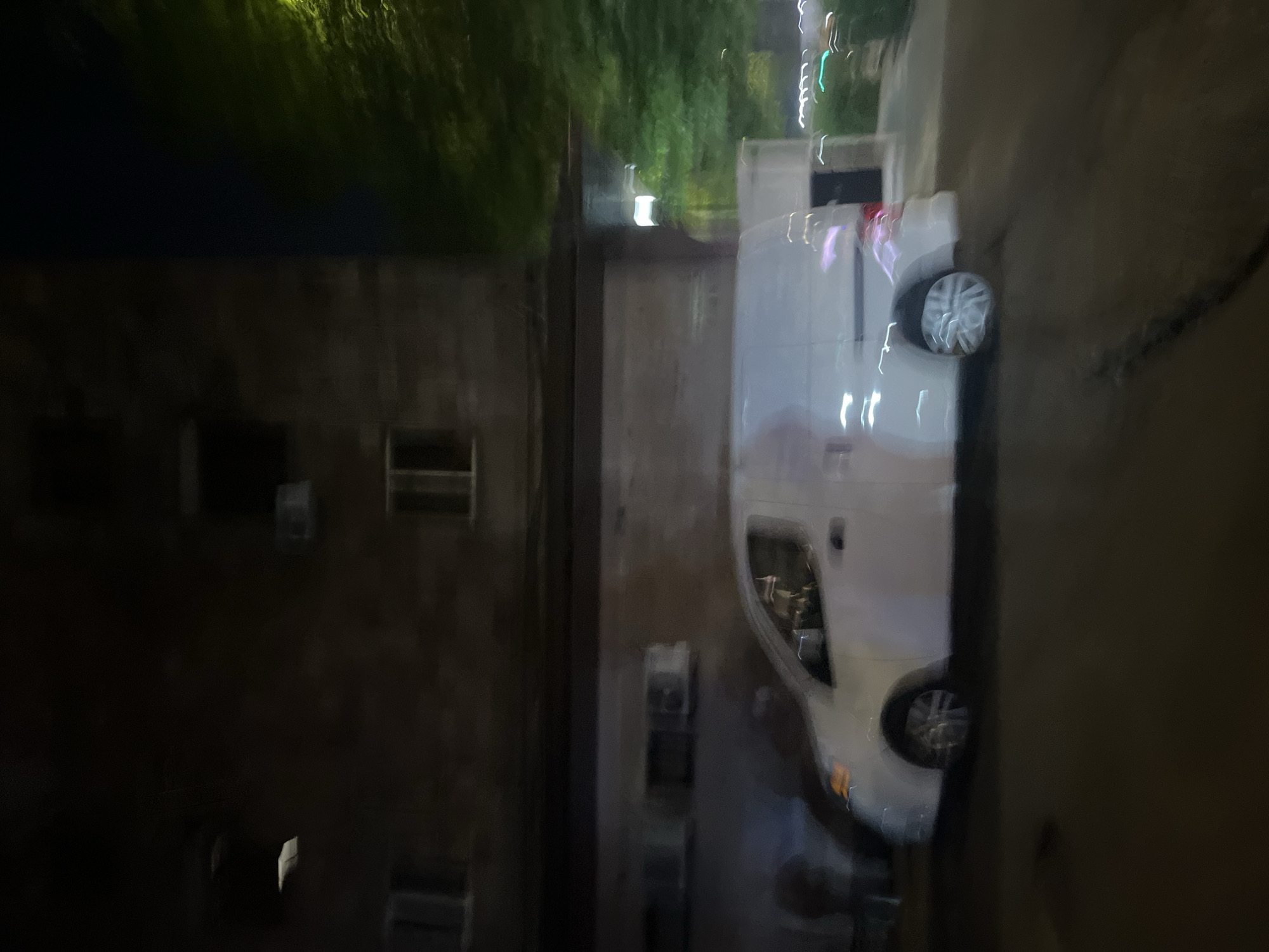 White van parked on Yerevan street during evening hours
