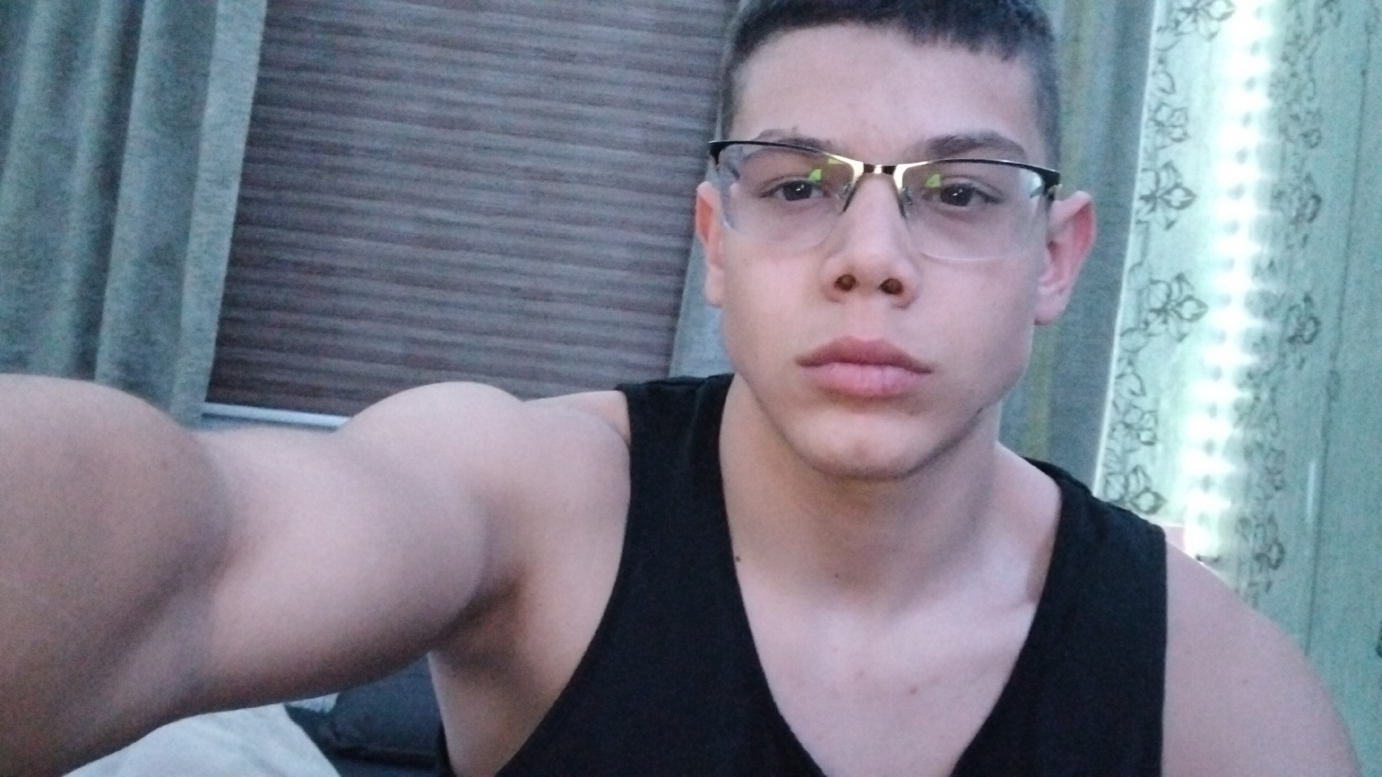 Young man takes flexing selfie in Troyan, Bulgaria