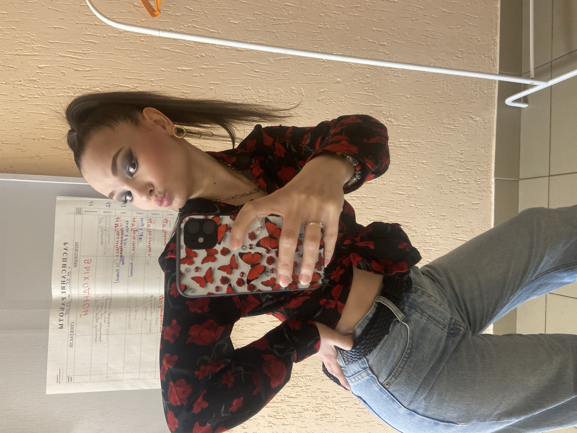 Woman takes selfie indoors in Chaikovsky, Russia