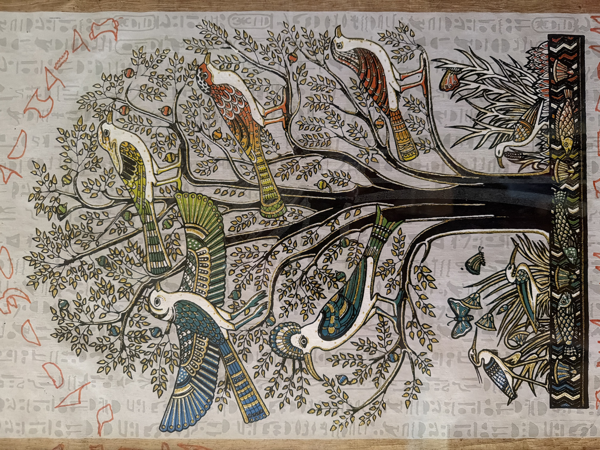 Egyptian-style papyrus illustration featuring a fruiting tree