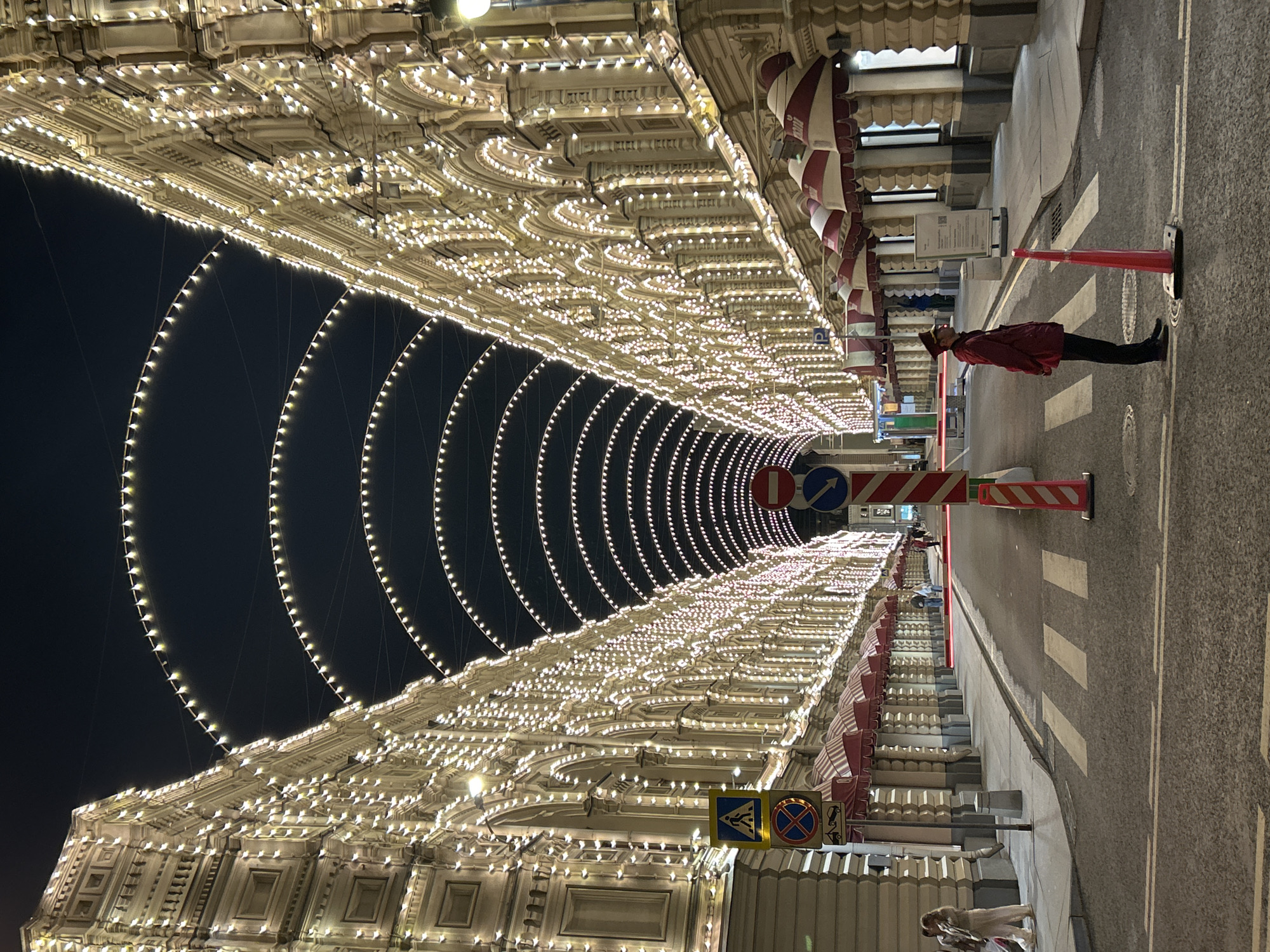 GUM department store glows under festive light canopies on Red Square