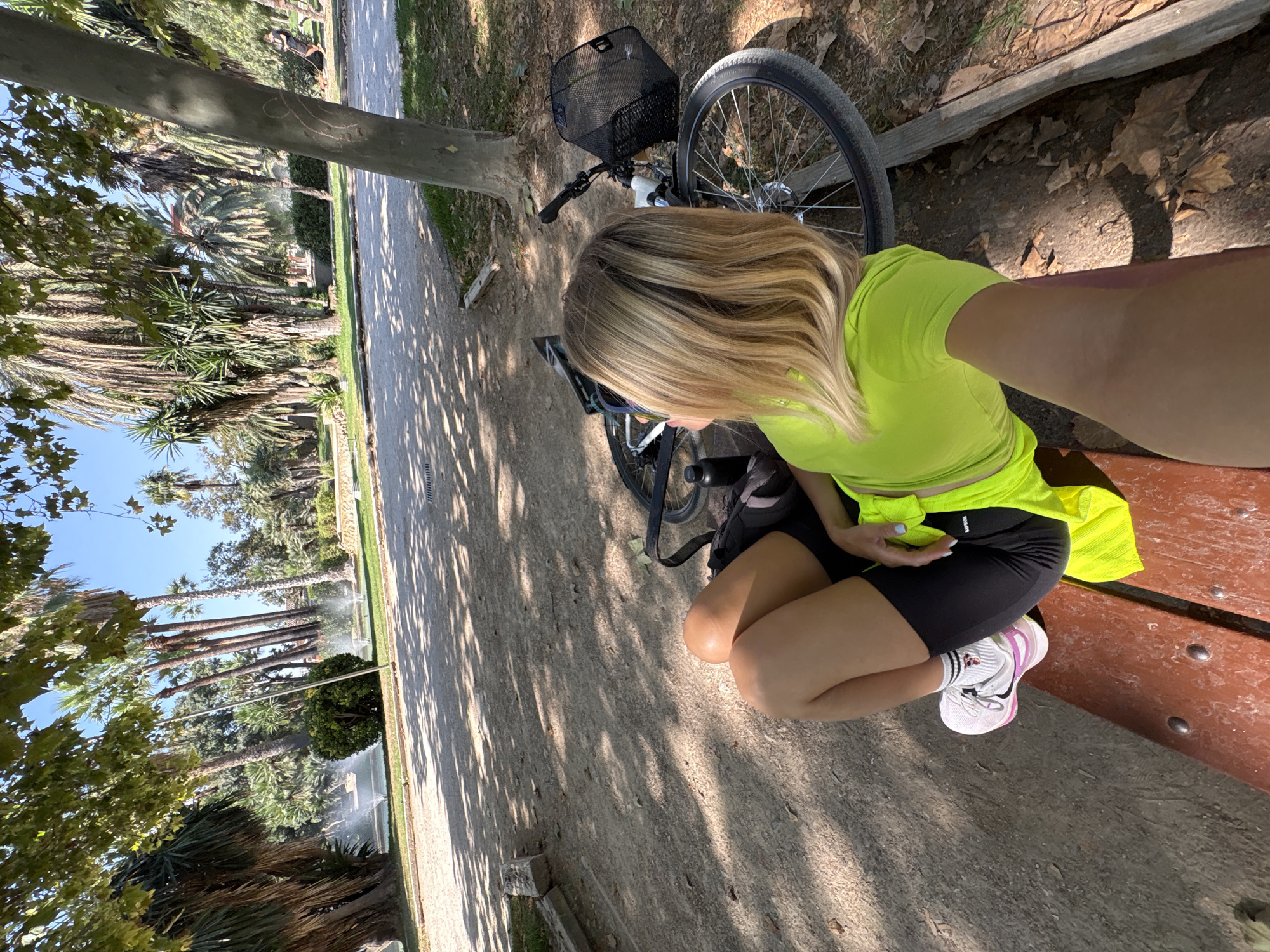 Quiet morning in a Valencia park with bikes and people