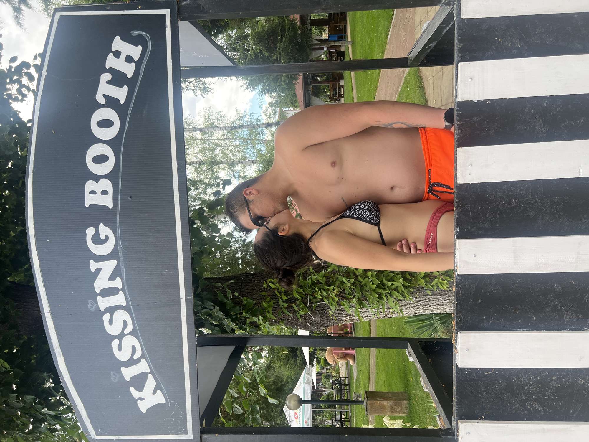 Kissing booth moment at an outdoor spot in Kubratovo