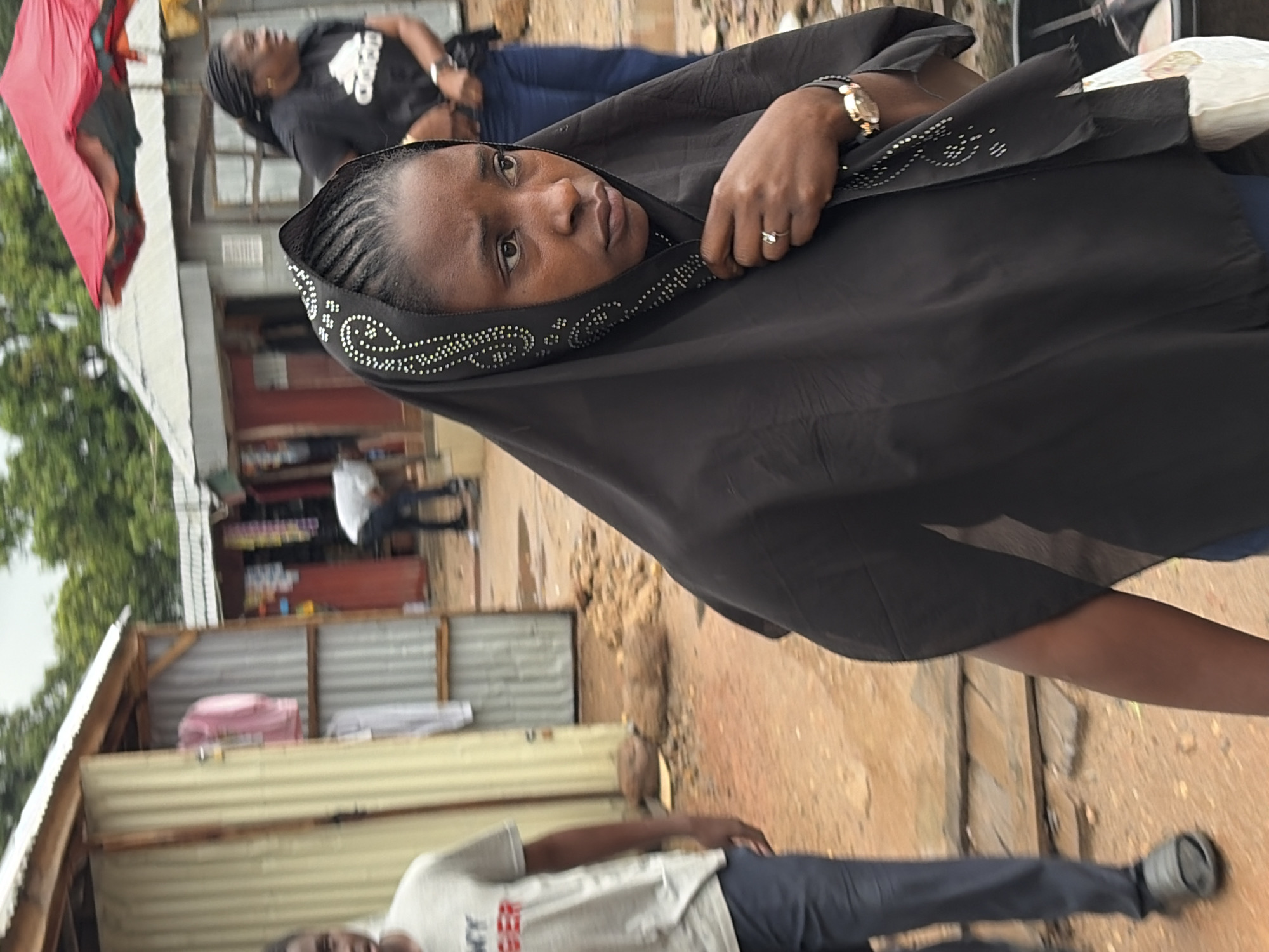 Rainy afternoon across Jos markets, streets, and shops