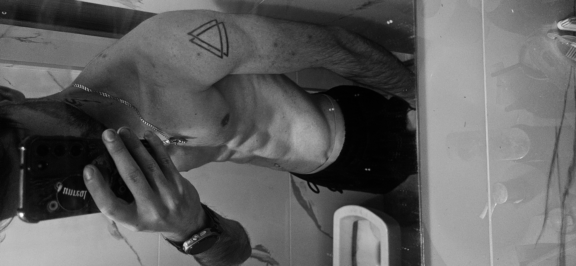 Person takes multiple bathroom mirror selfies in Plovdiv
