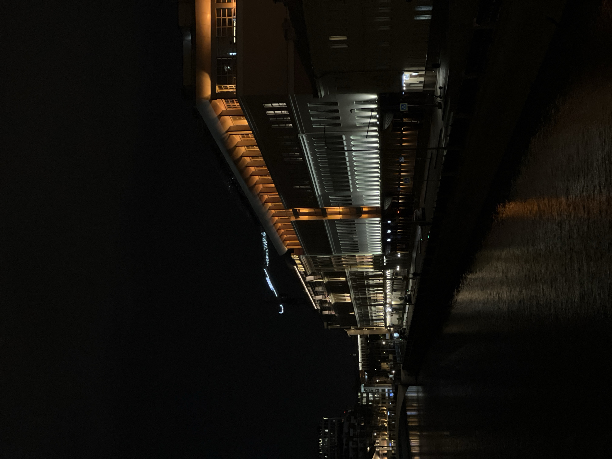 Nighttime Moscow riverfront buildings captured by witnesses