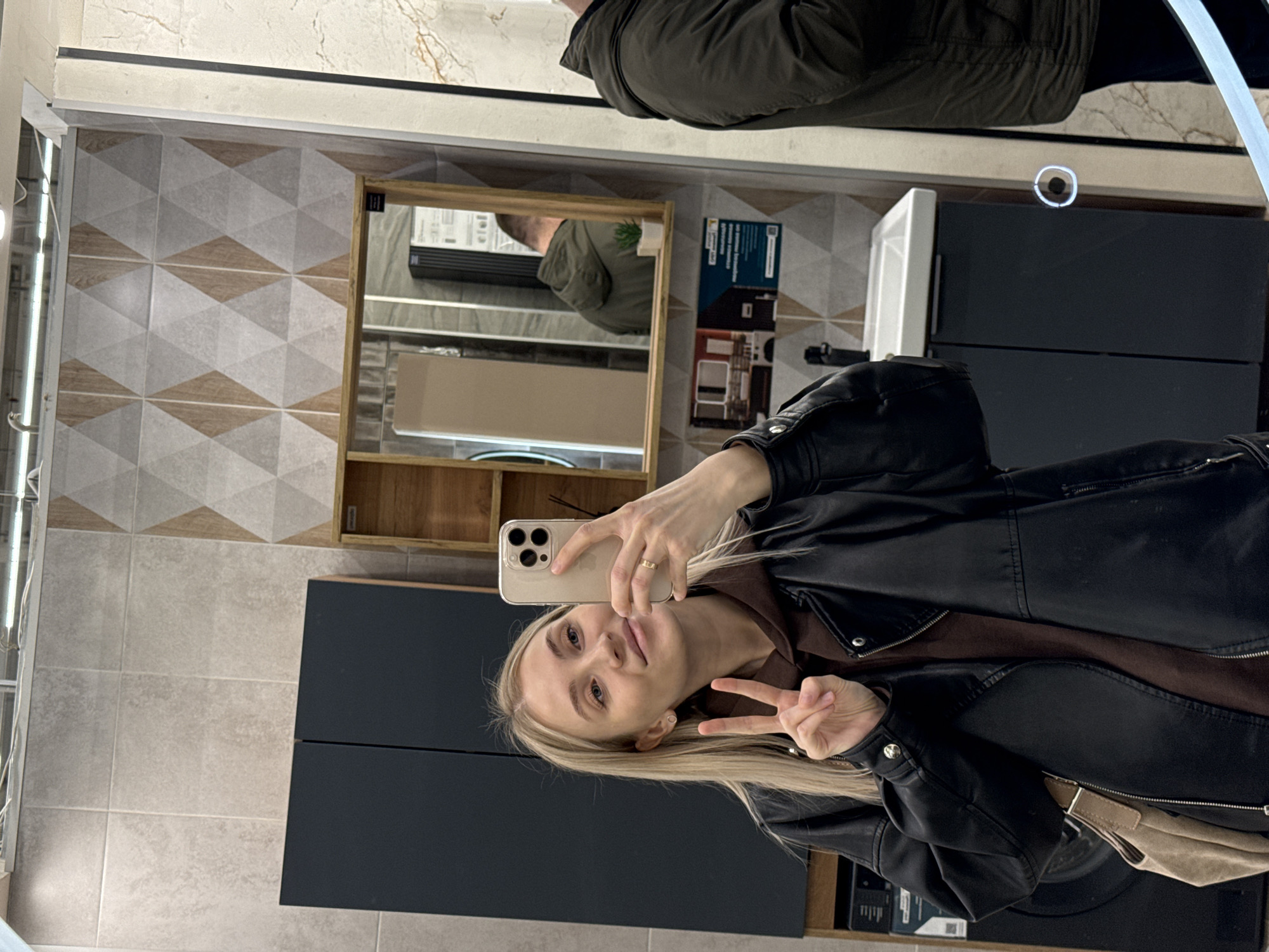 Woman poses outside building materials store in Izhevsk