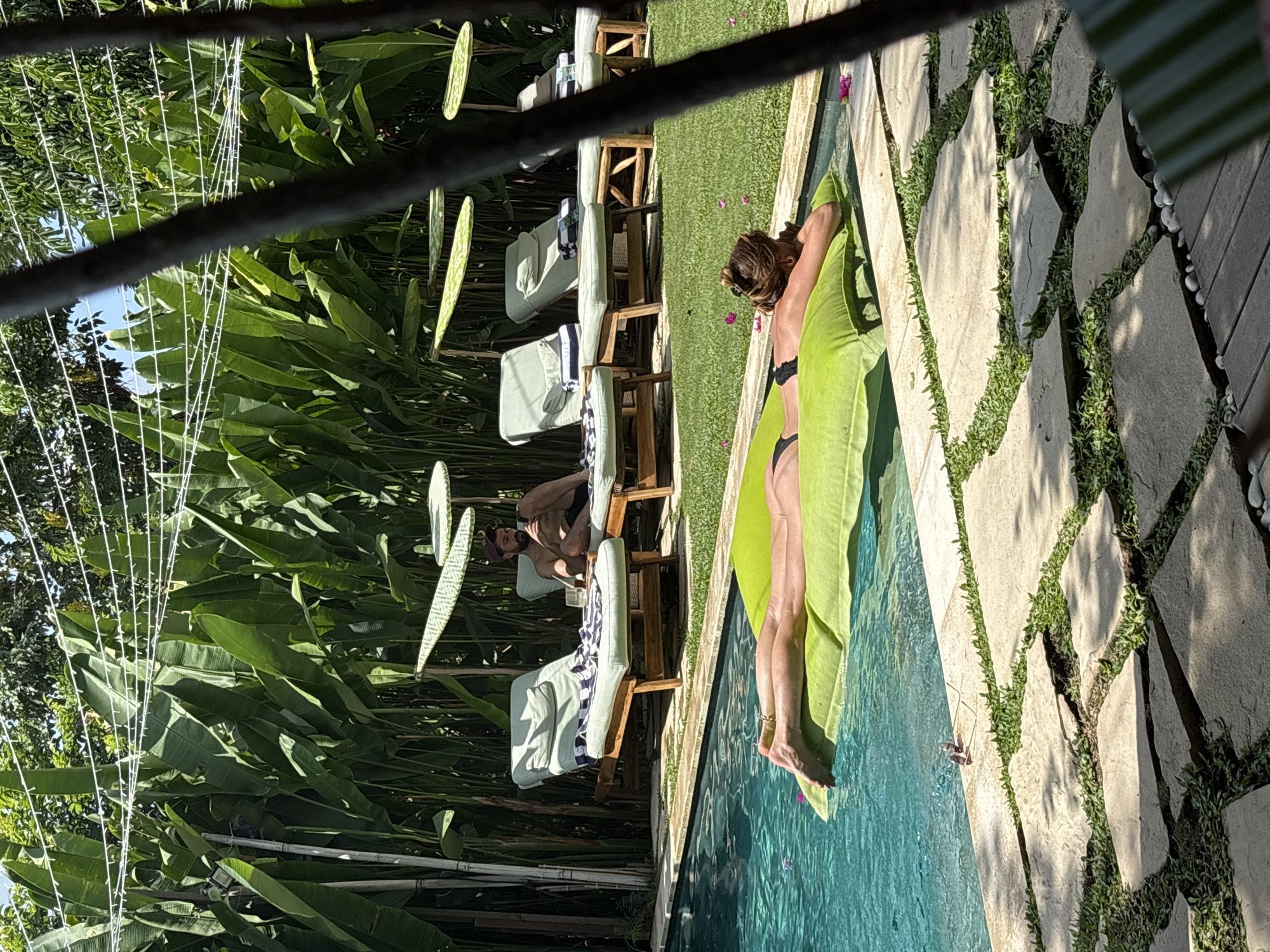 Couple enjoys morning pool time in Kuta Selatan