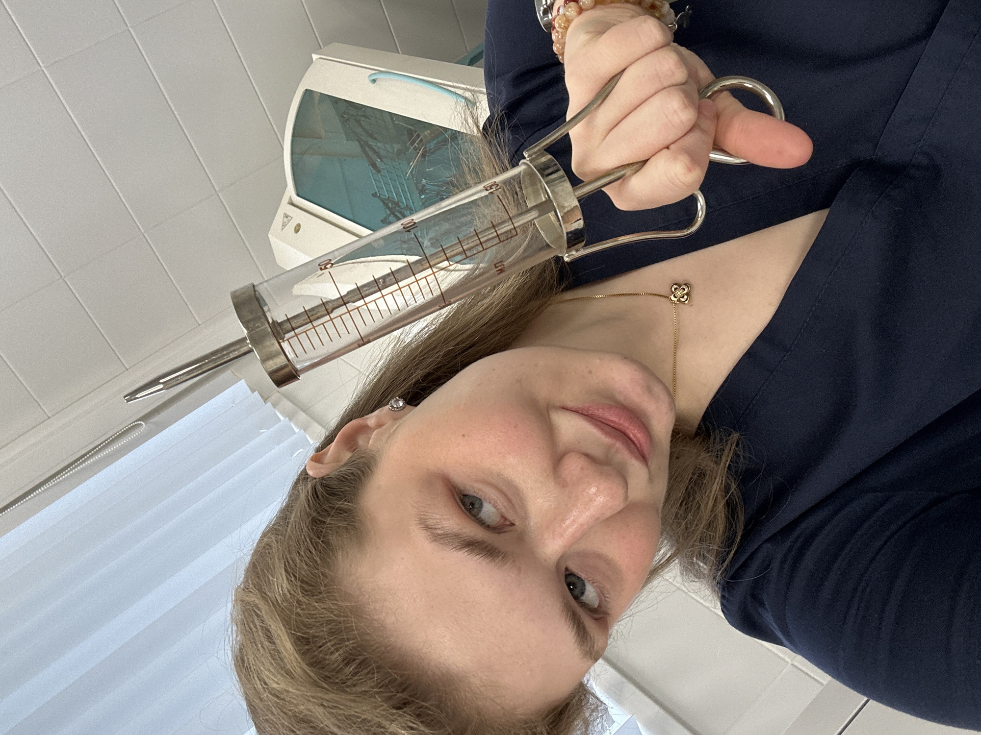 Healthcare worker documents medical equipment during shift in Kazan