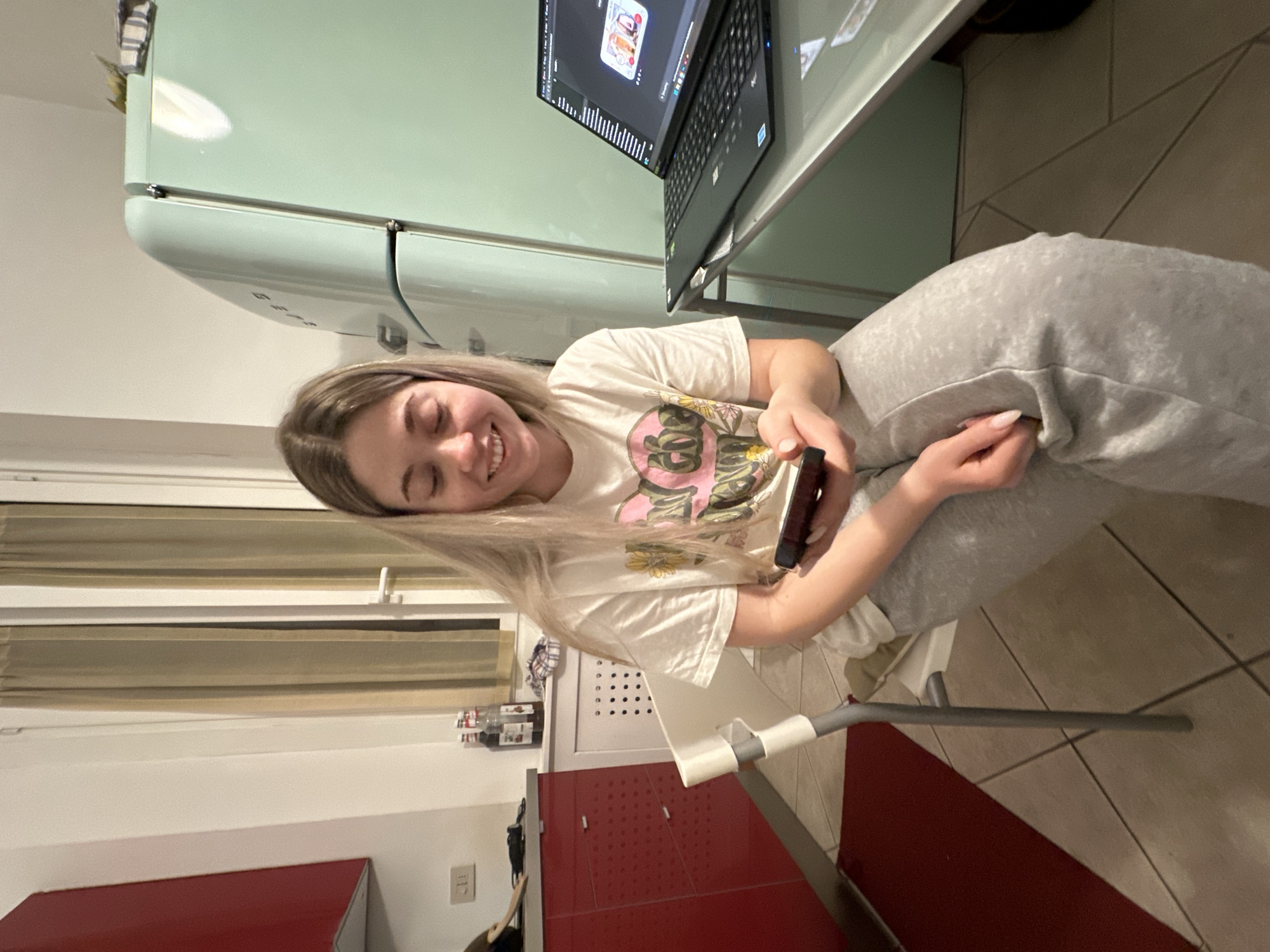 Woman smiling in Milan kitchen area Wednesday evening