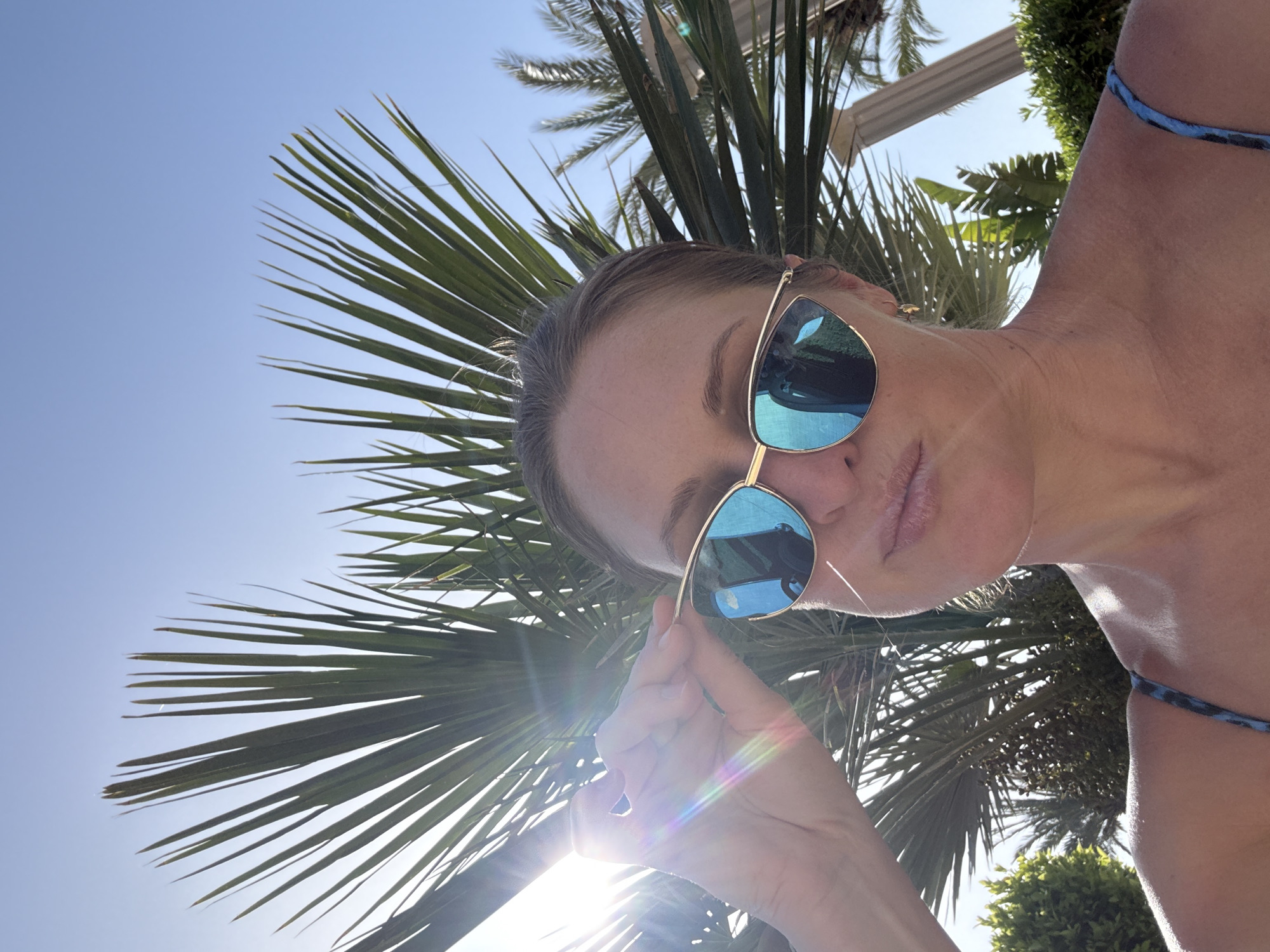 Woman enjoys early morning resort vacation in Serik, Turkey