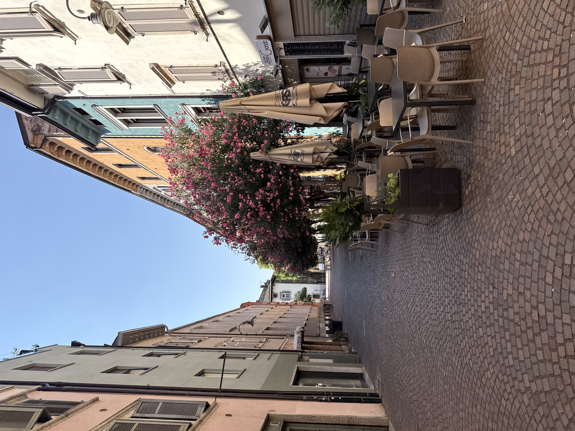 Cobblestone streets and pizza prep in Trento