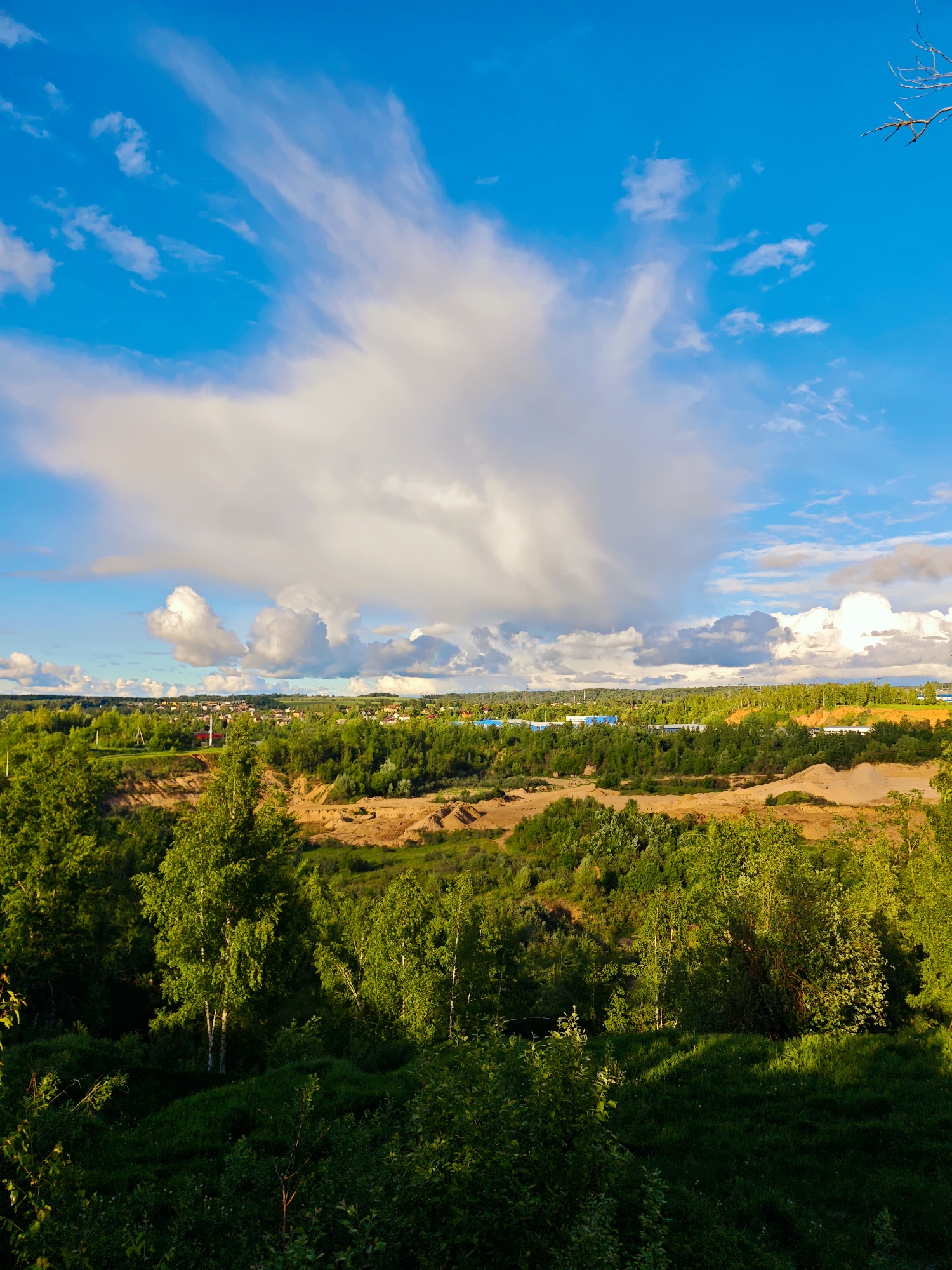 Landscape views documented in Dmitrov, Russia showing vegetation, quarry