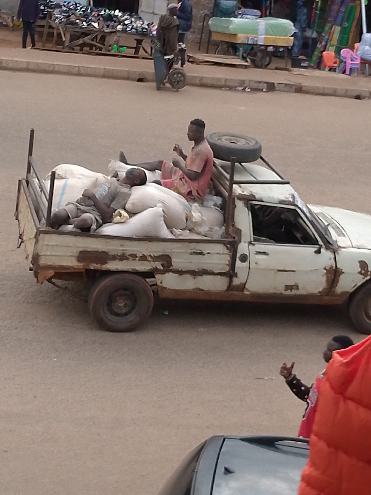 Daily market life documented in Bukuru, Nigeria street scenes