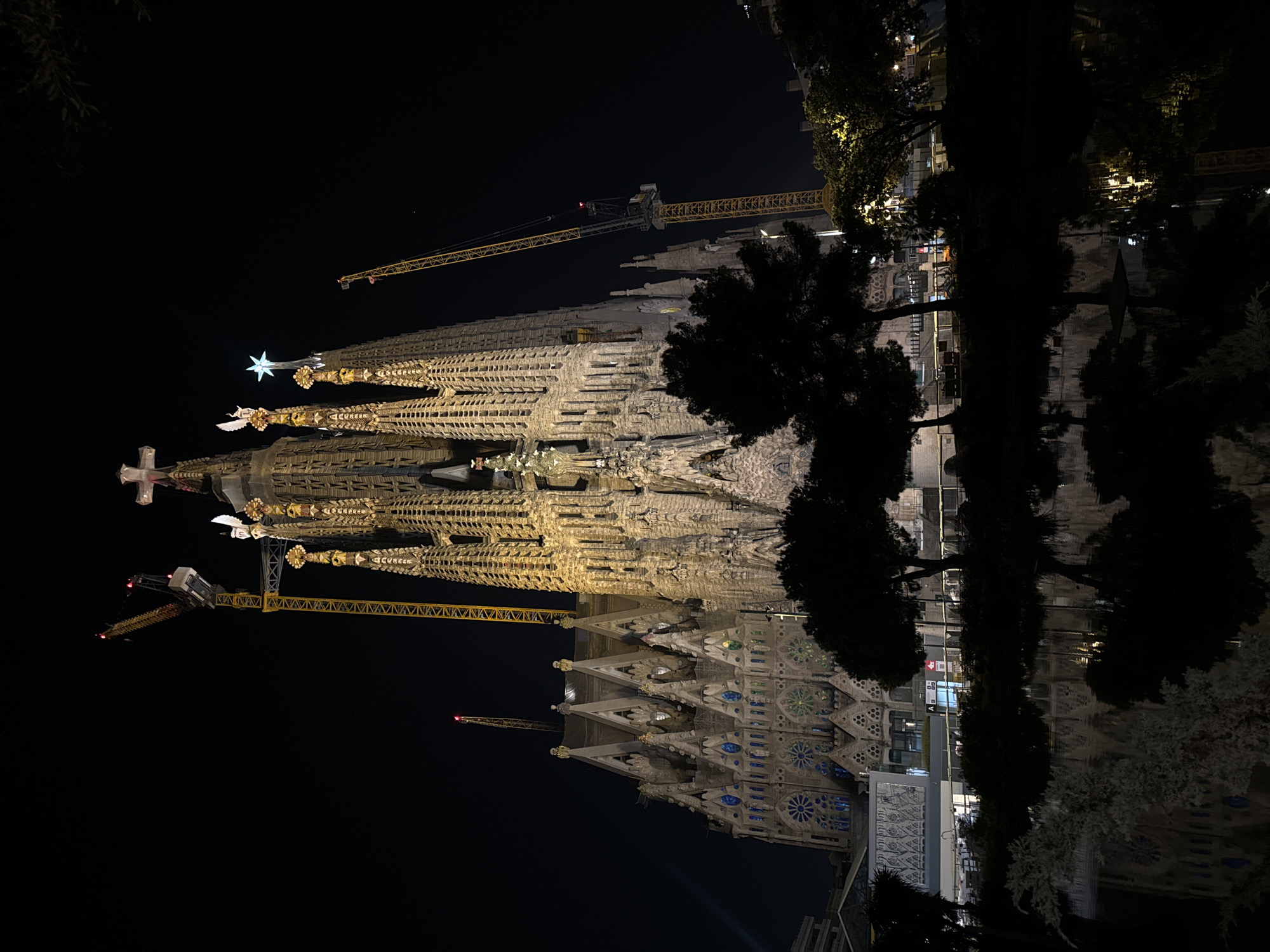 Nighttime documentation of illuminated Sagrada Familia basilica in Barcelona