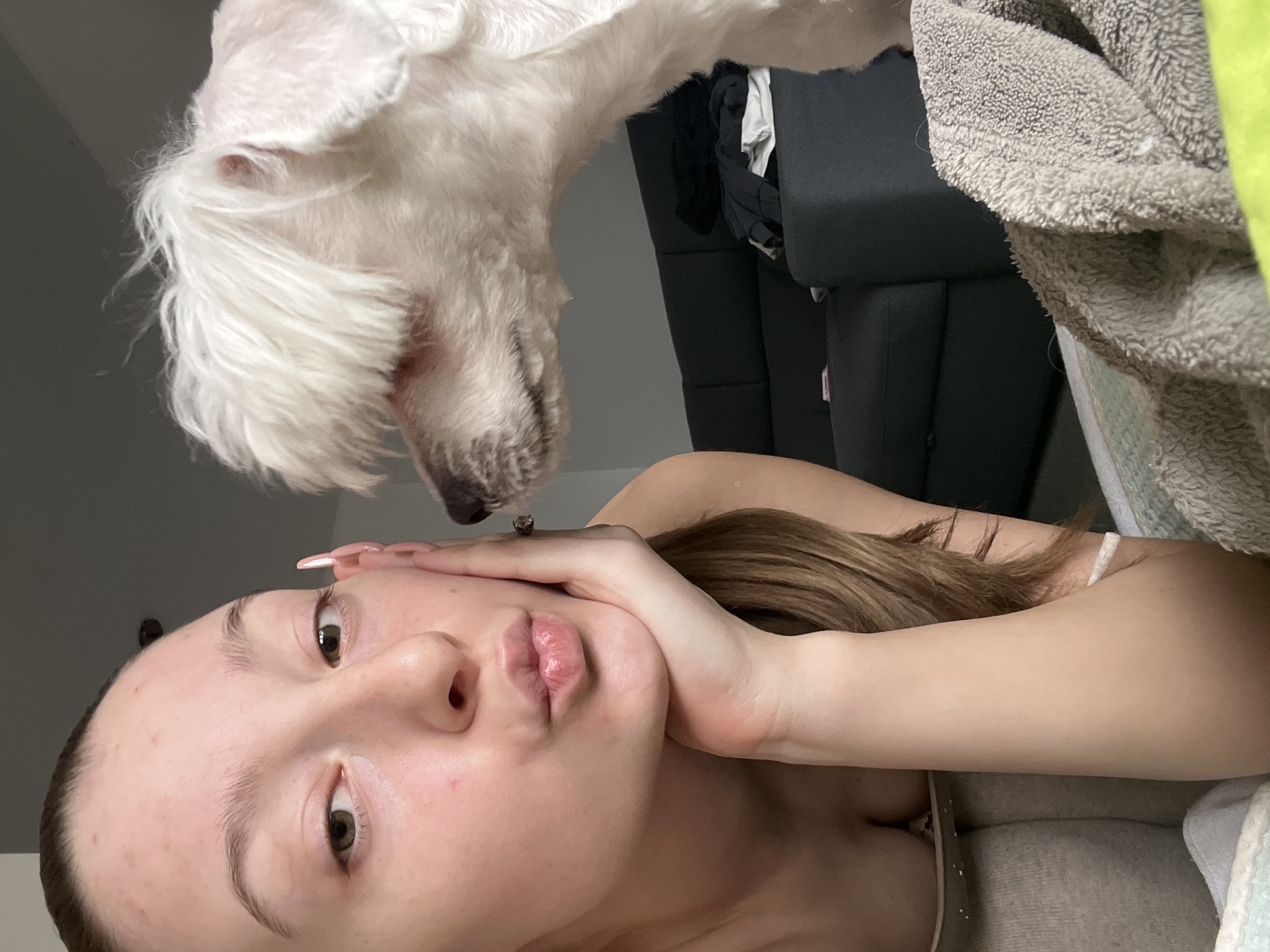 Woman takes selfies with dog in Varna home