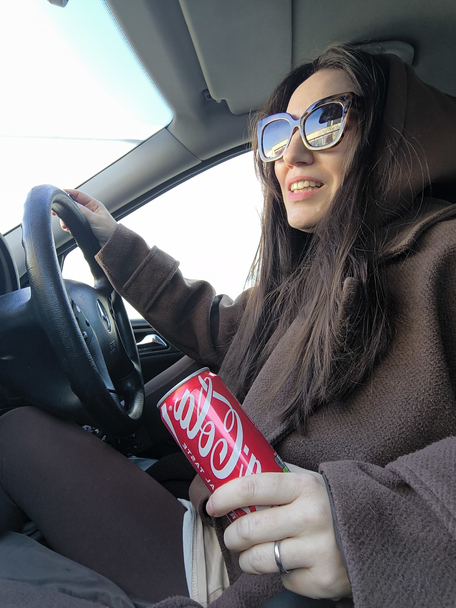 Woman in tortoiseshell sunglasses spotted in car in Riga