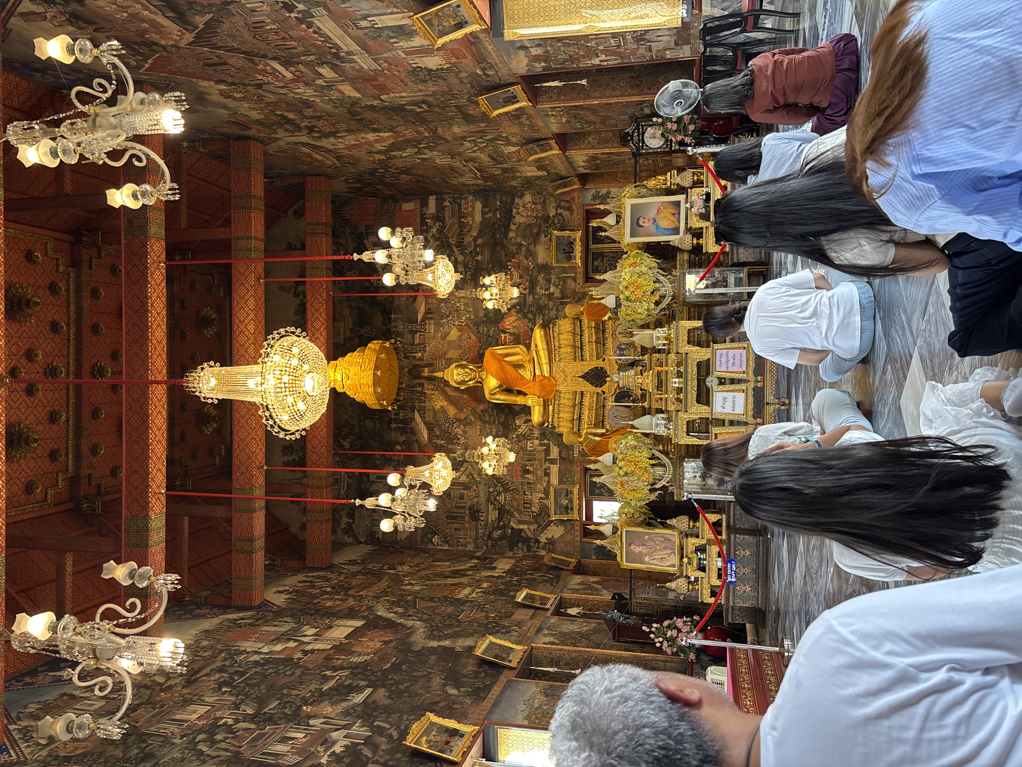 Morning prayers and temple visits documented in Bangkok