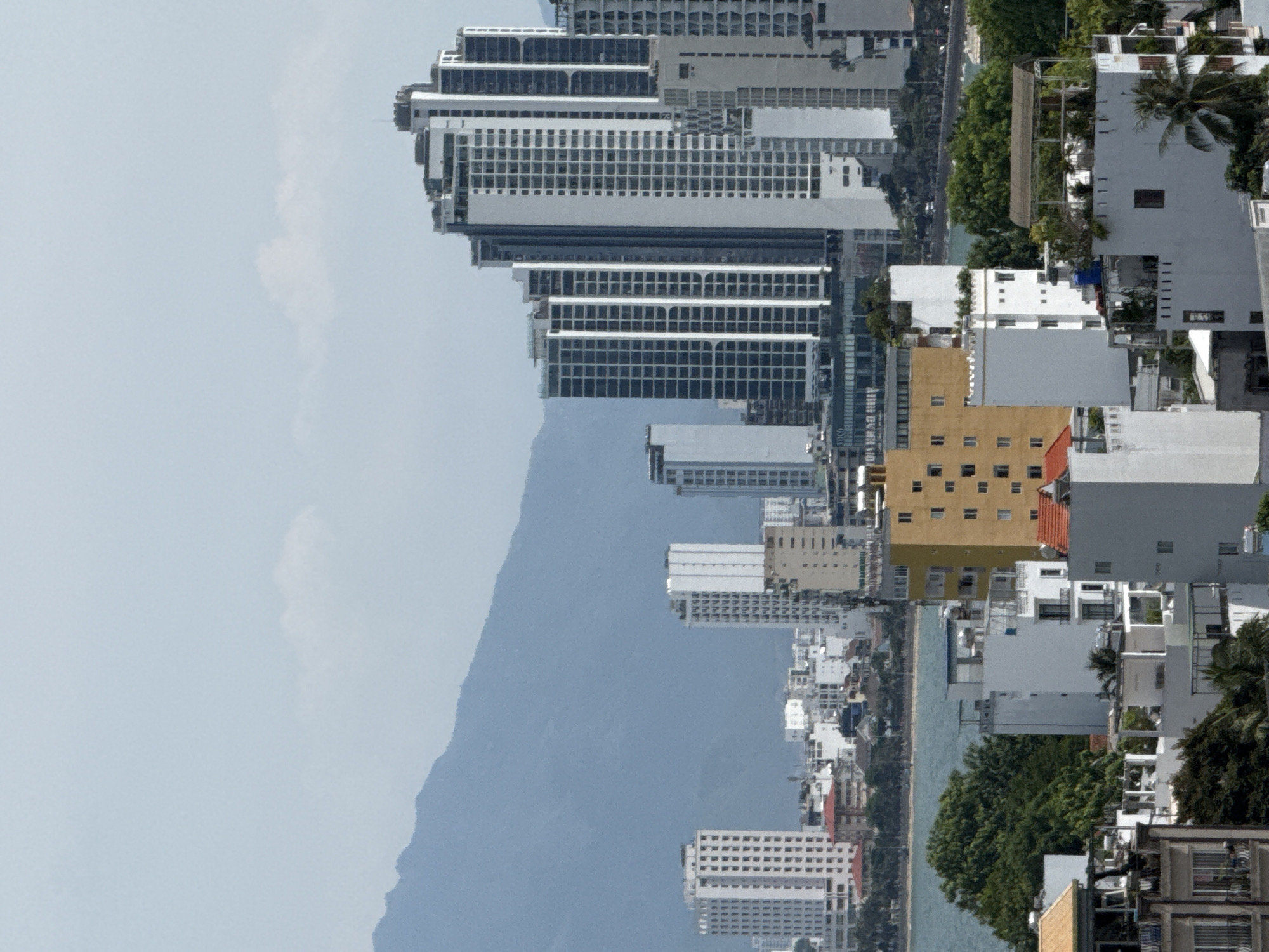 Nha Trang hillside neighborhood, morning street and rooftop life