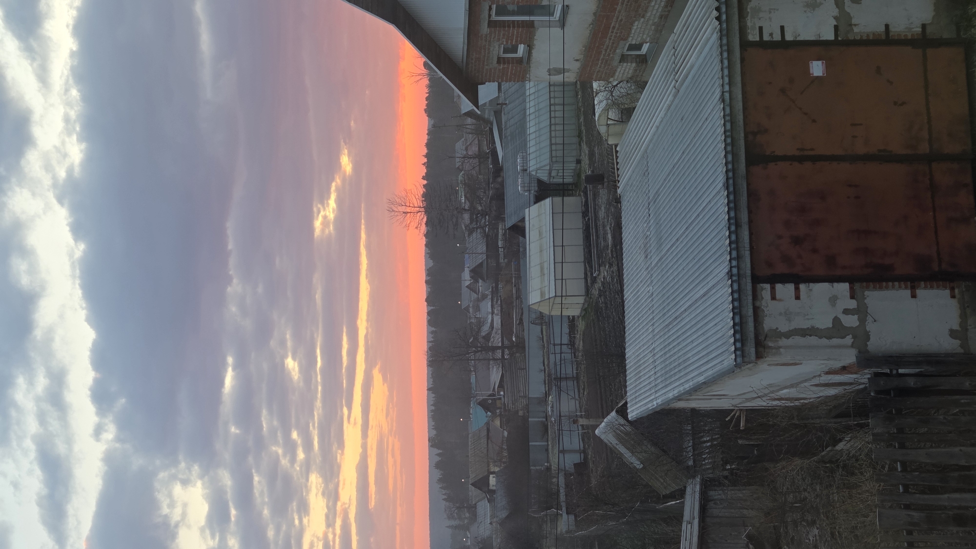 Colorful sunset observed over Chaikovsky residential area