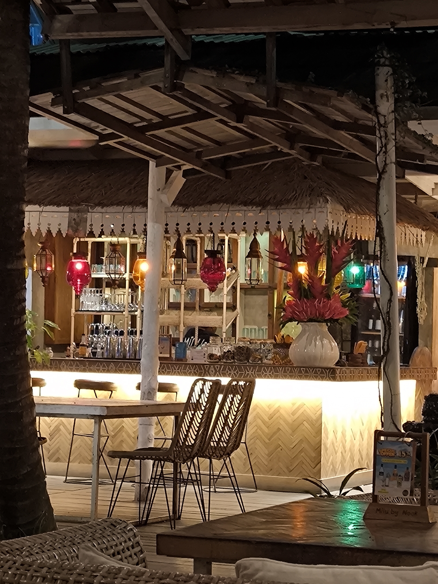 Evening dining scene captured at tropical restaurant in North Kuta