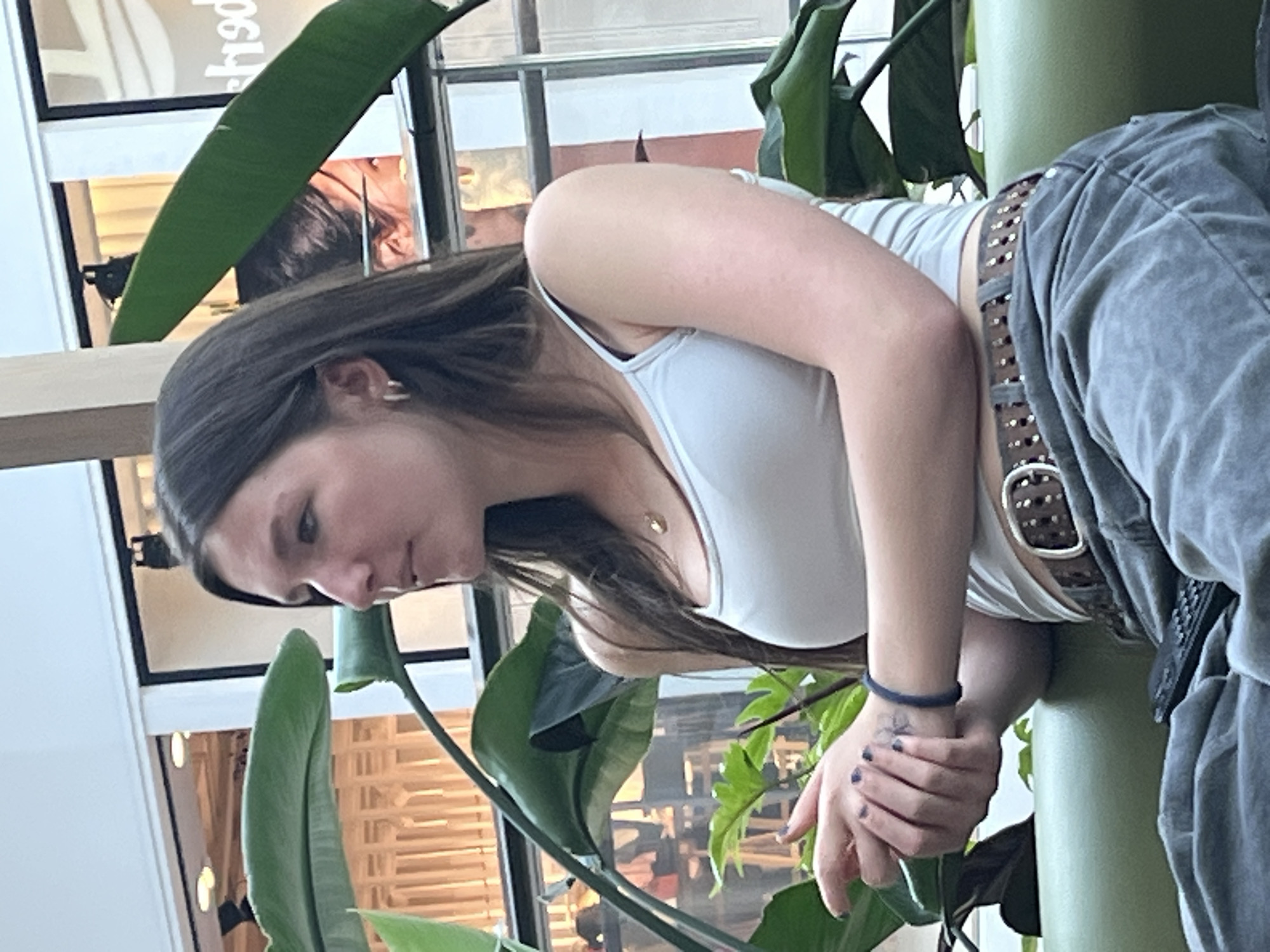Woman spotted indoors in Luxembourg wearing casual attire