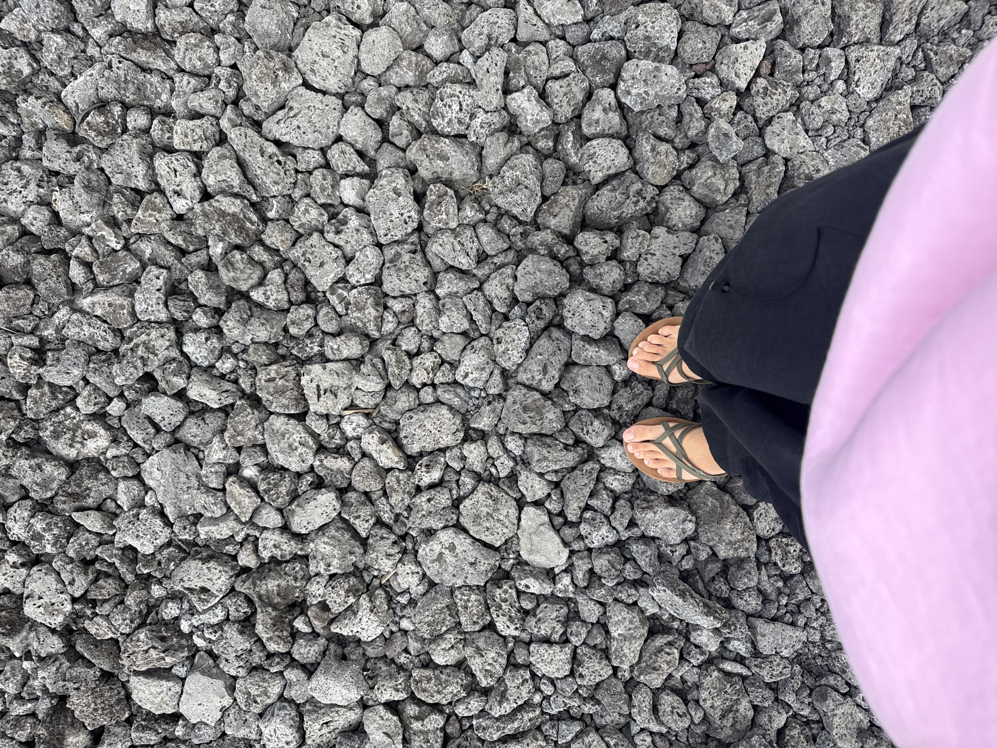 Exploring Kintamani's black lava fields on a cloudy Bali morning