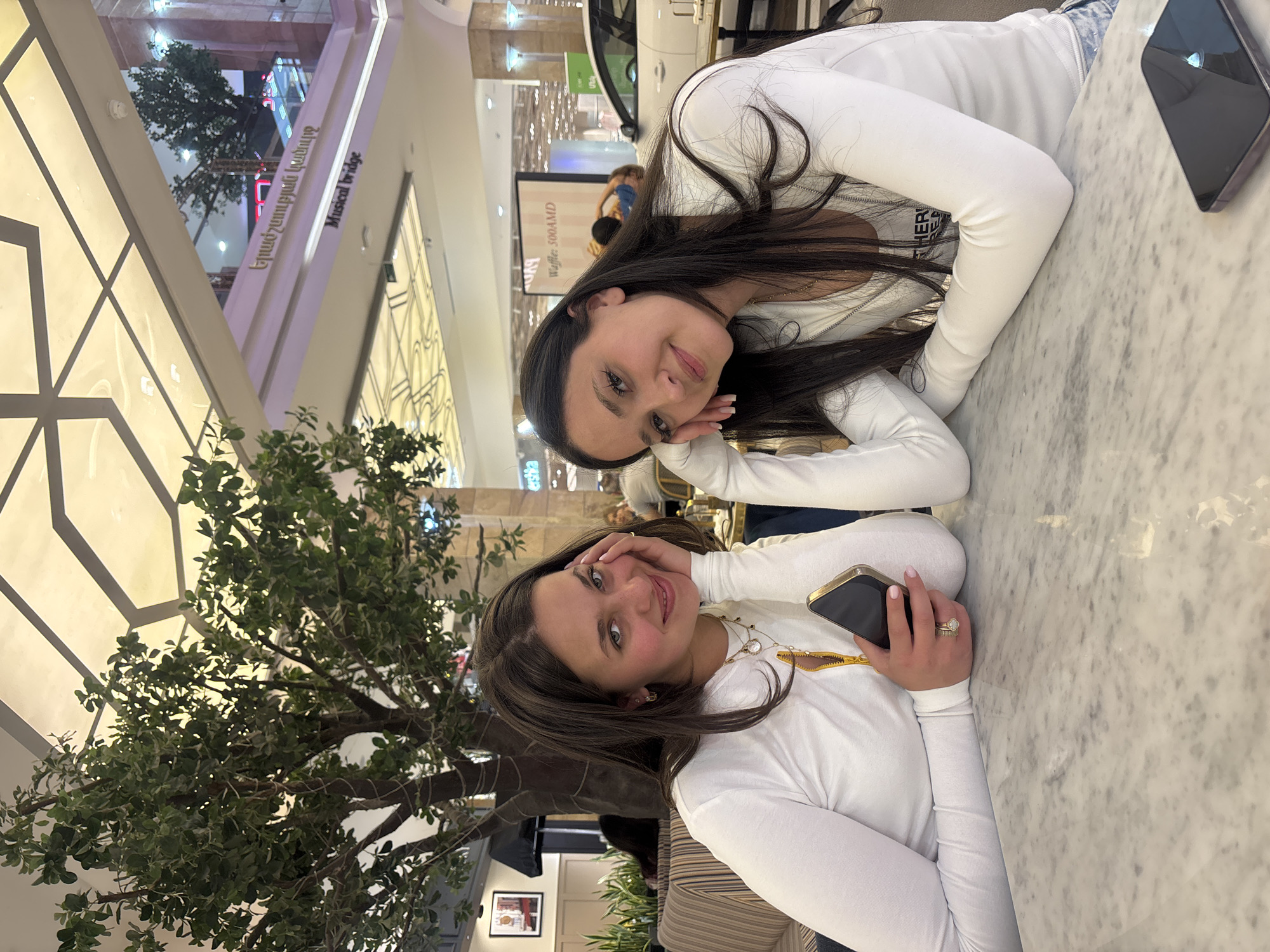 Friends spend afternoon shopping and taking photos at Yerevan mall