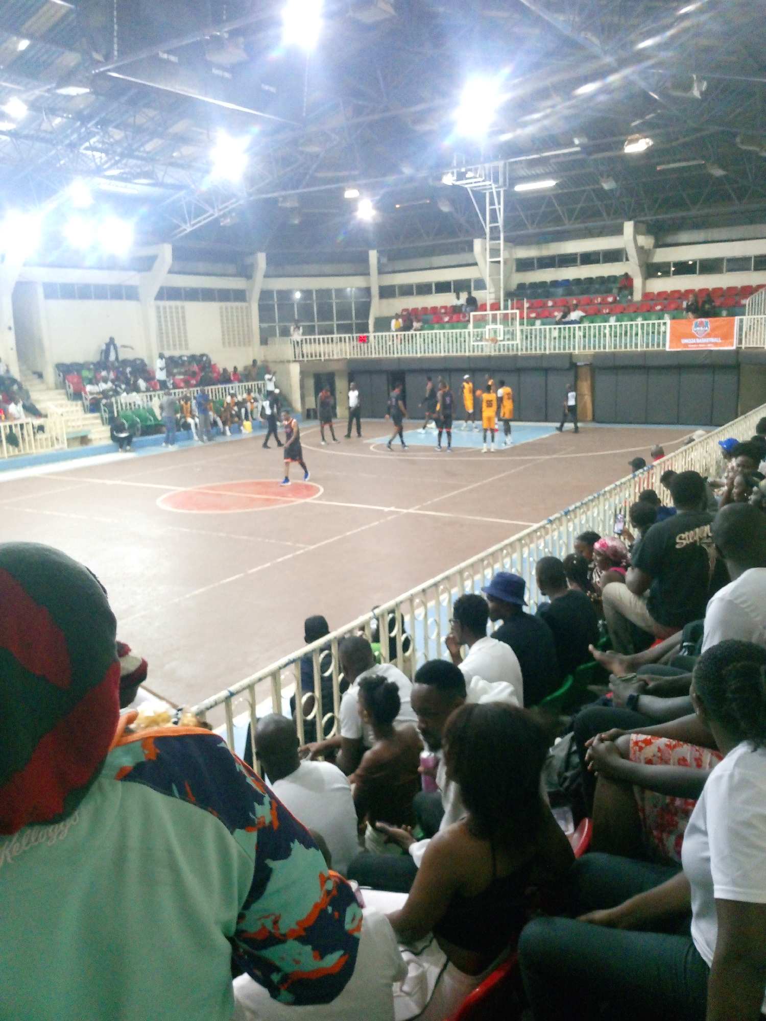 Basketball game draws crowds to Nairobi gymnasium Sunday afternoon
