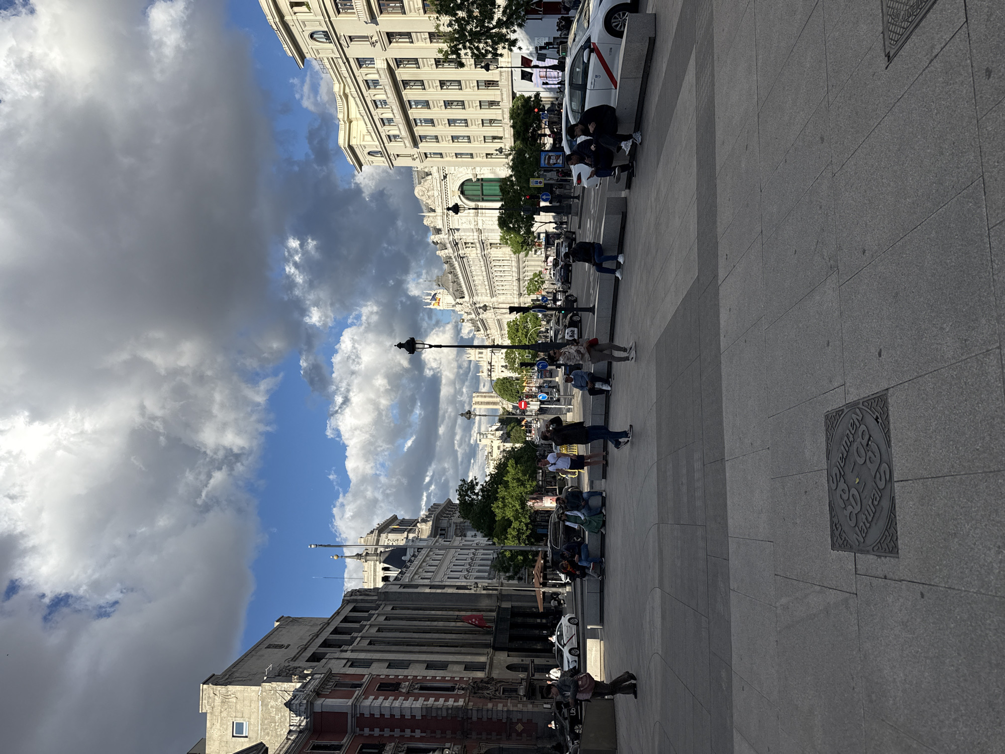 Evening street life documented in central Madrid