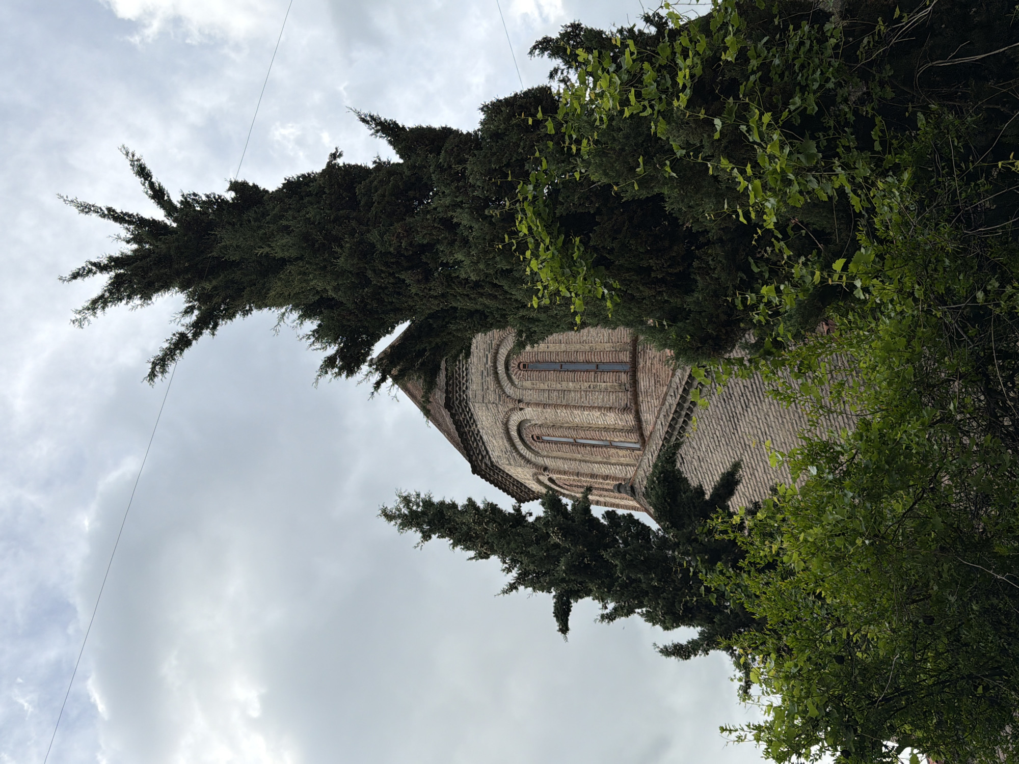 Tourist documents afternoon walk through historic Tbilisi neighborhoods