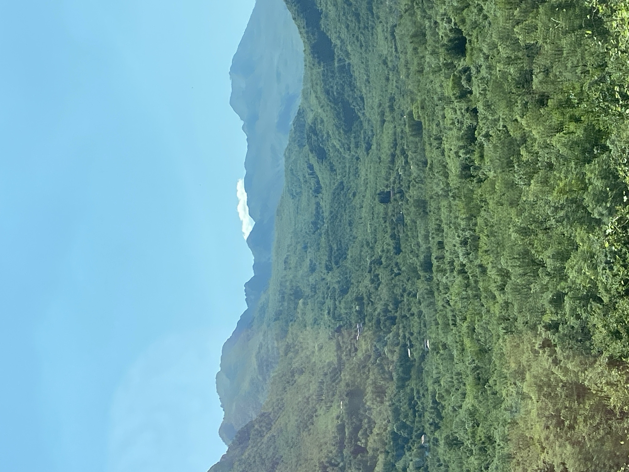 Clear skies over green mountain landscape near Sotonići, Montenegro